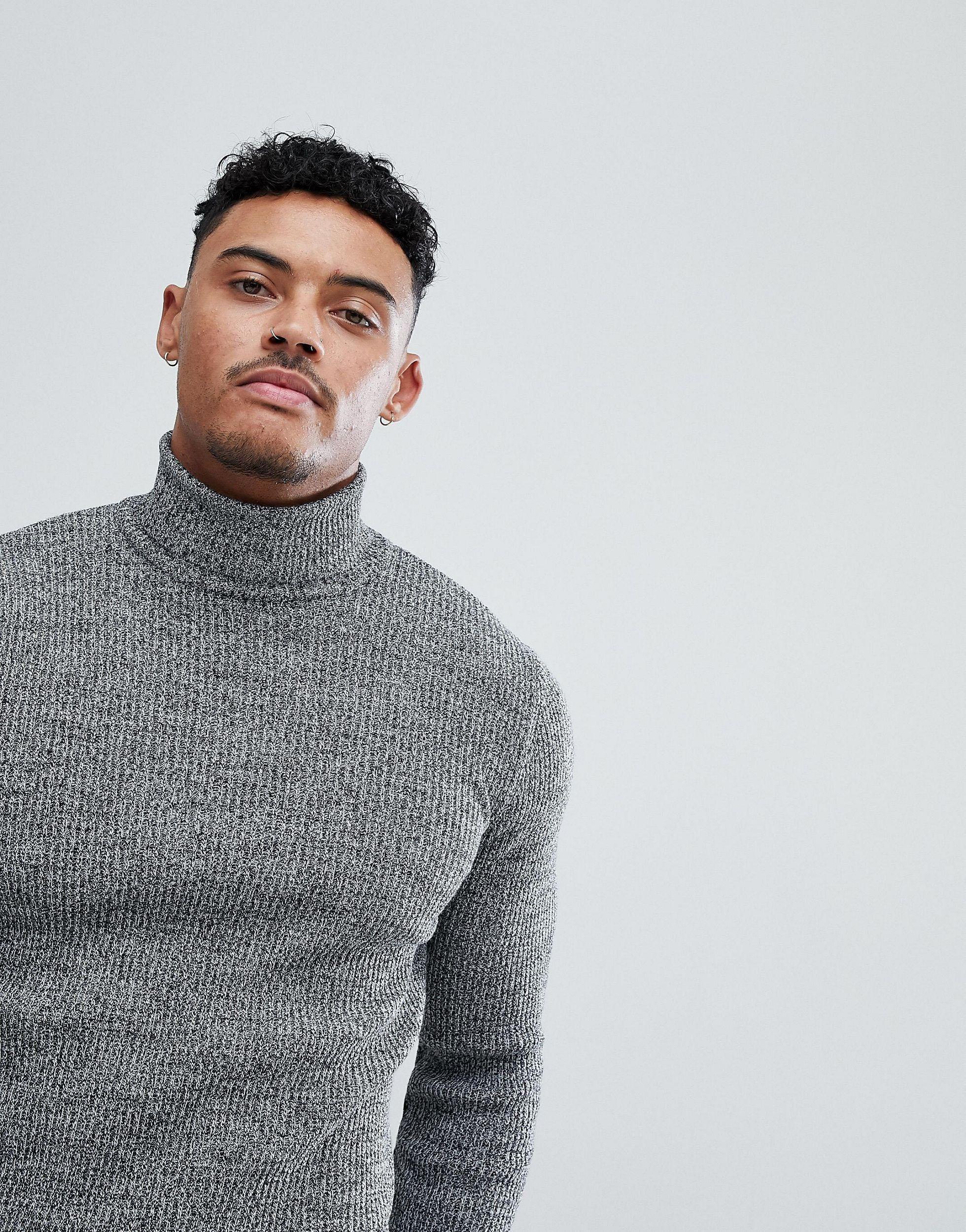 white ribbed roll neck jumper