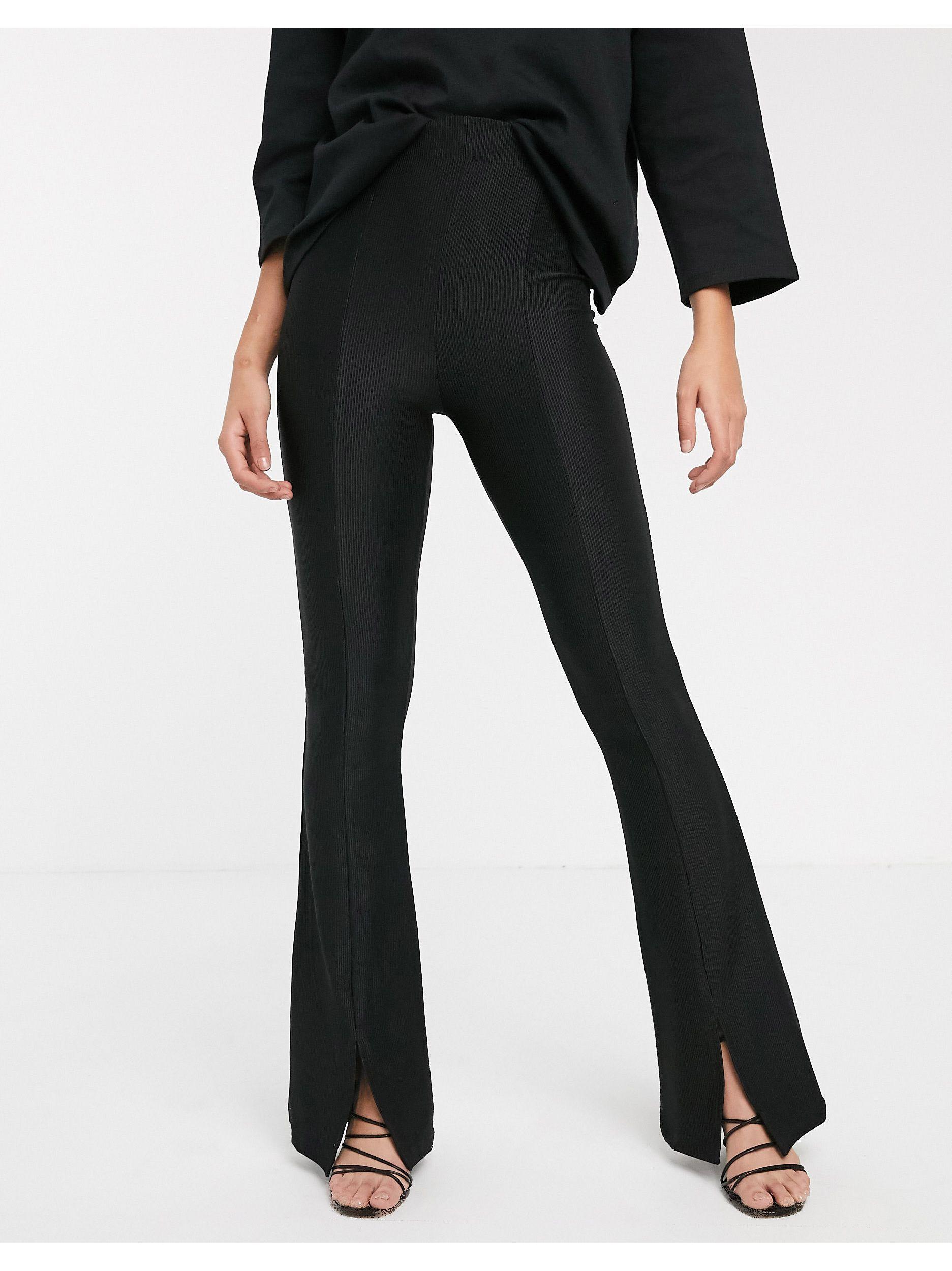 Stradivarius Ribbed Jersey Flare Trousers With Slit in Black | Lyst