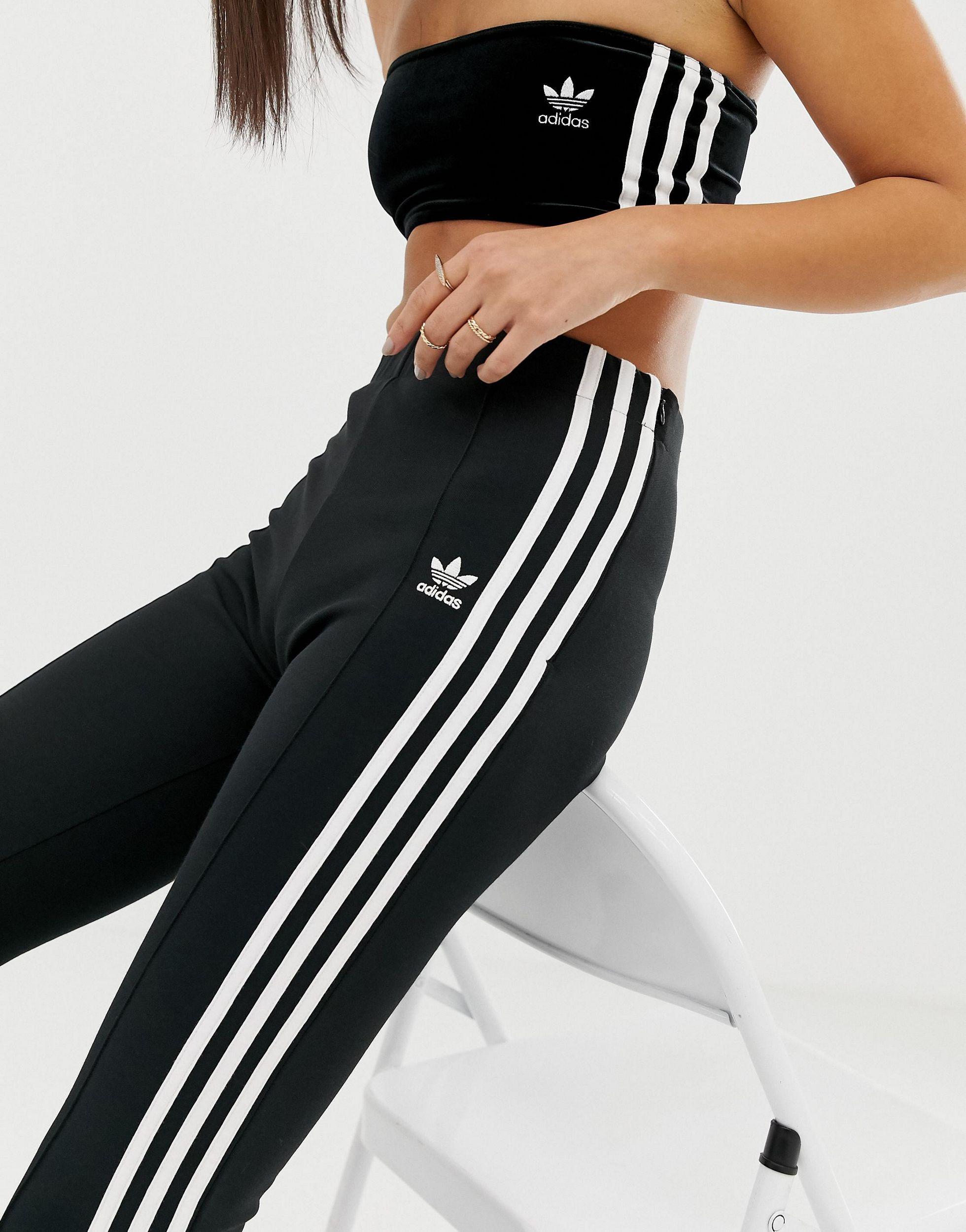 adidas Originals Katoen Adicolor - Flared Broek Met Drie Strepen, in het  Zwart - Lyst