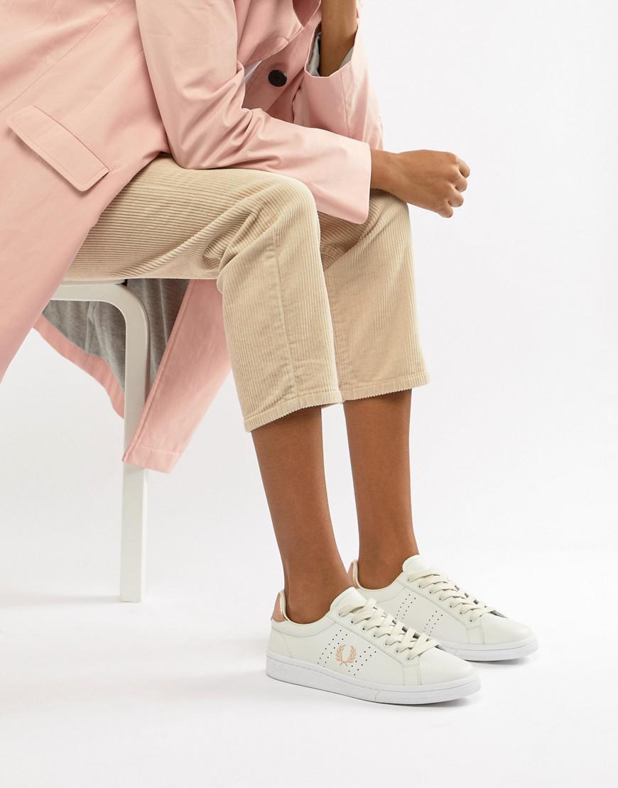 white trainers with gold trim