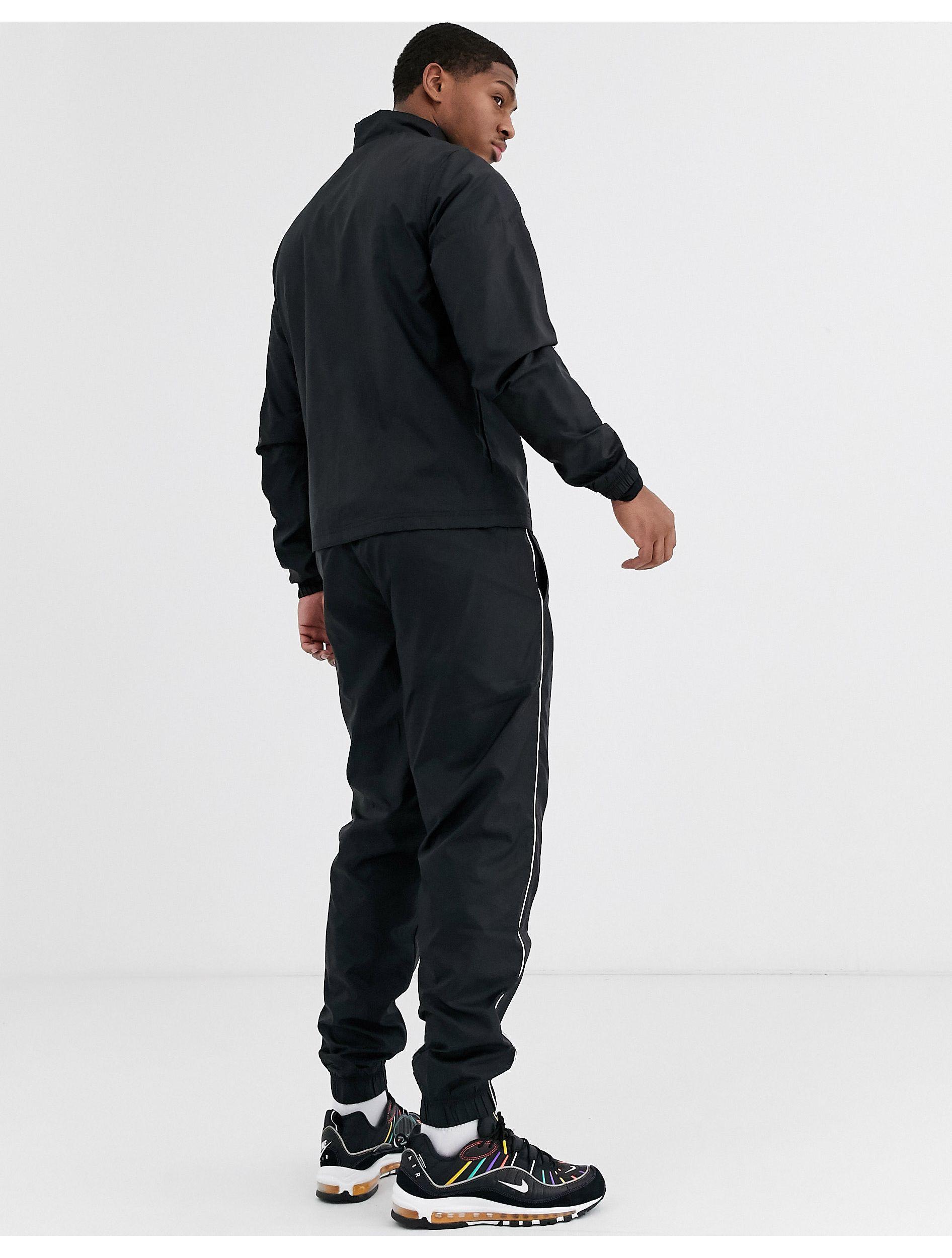 Chándal Nike Sportswear Sport Essentials Poly Knit negro/blanco - Tienda de  fútbol