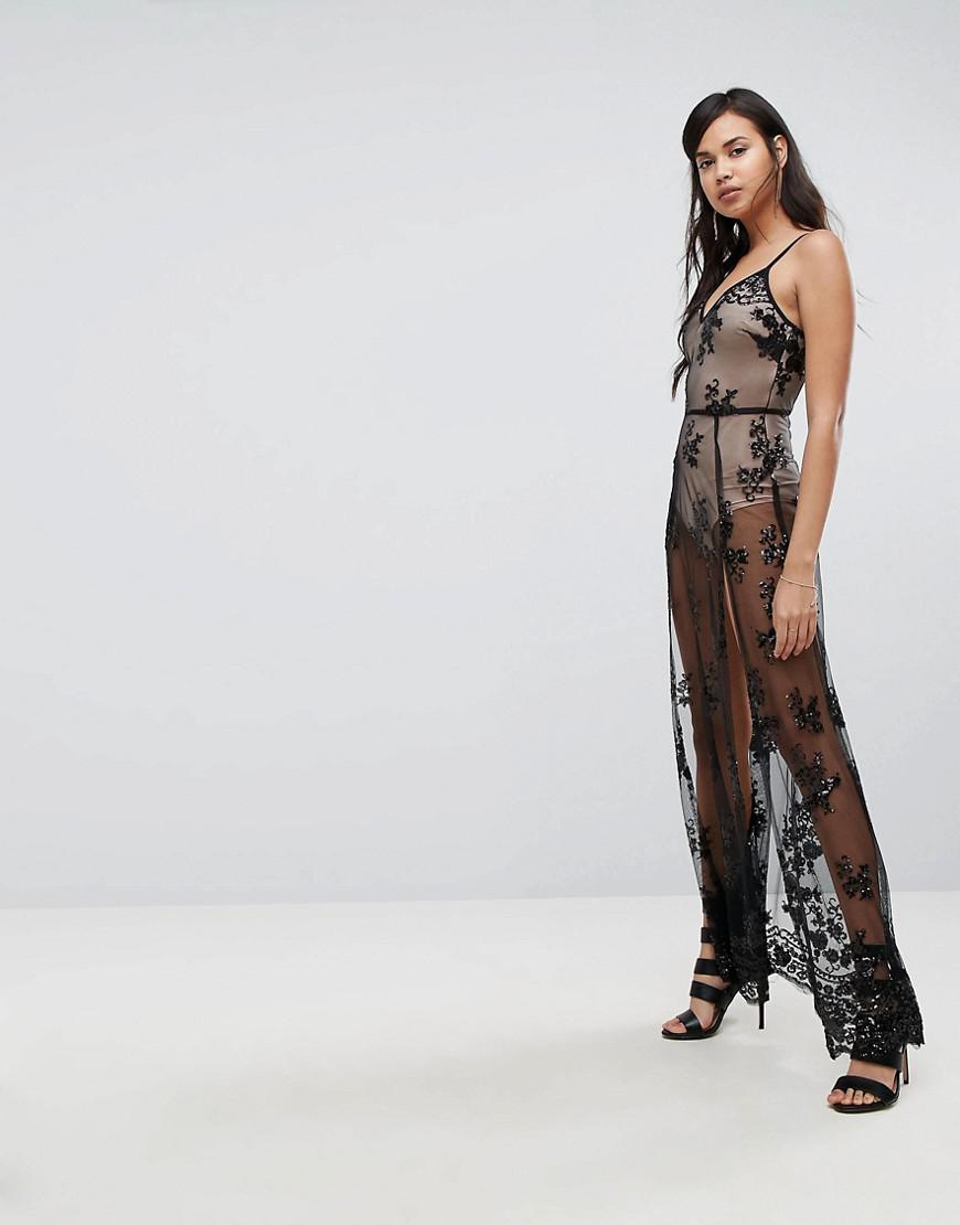 Robe longue en dentelle transparente sequins avec body Naanaa en coloris  Noir | Lyst