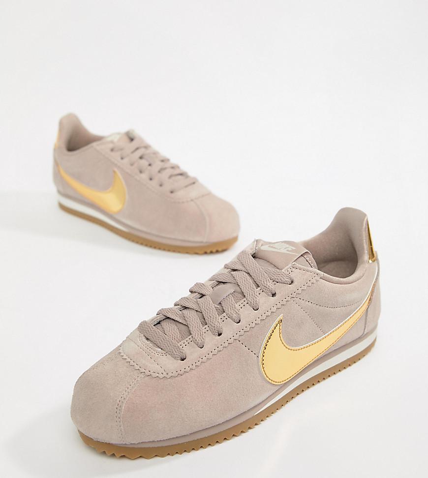 nike pink with swoosh suede cortez trainers