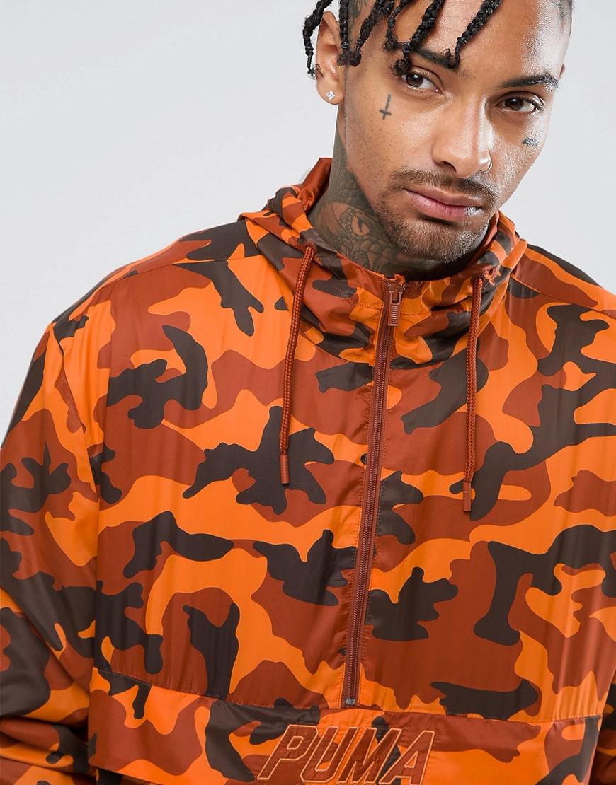 puma pullover windbreaker in camo print in orange