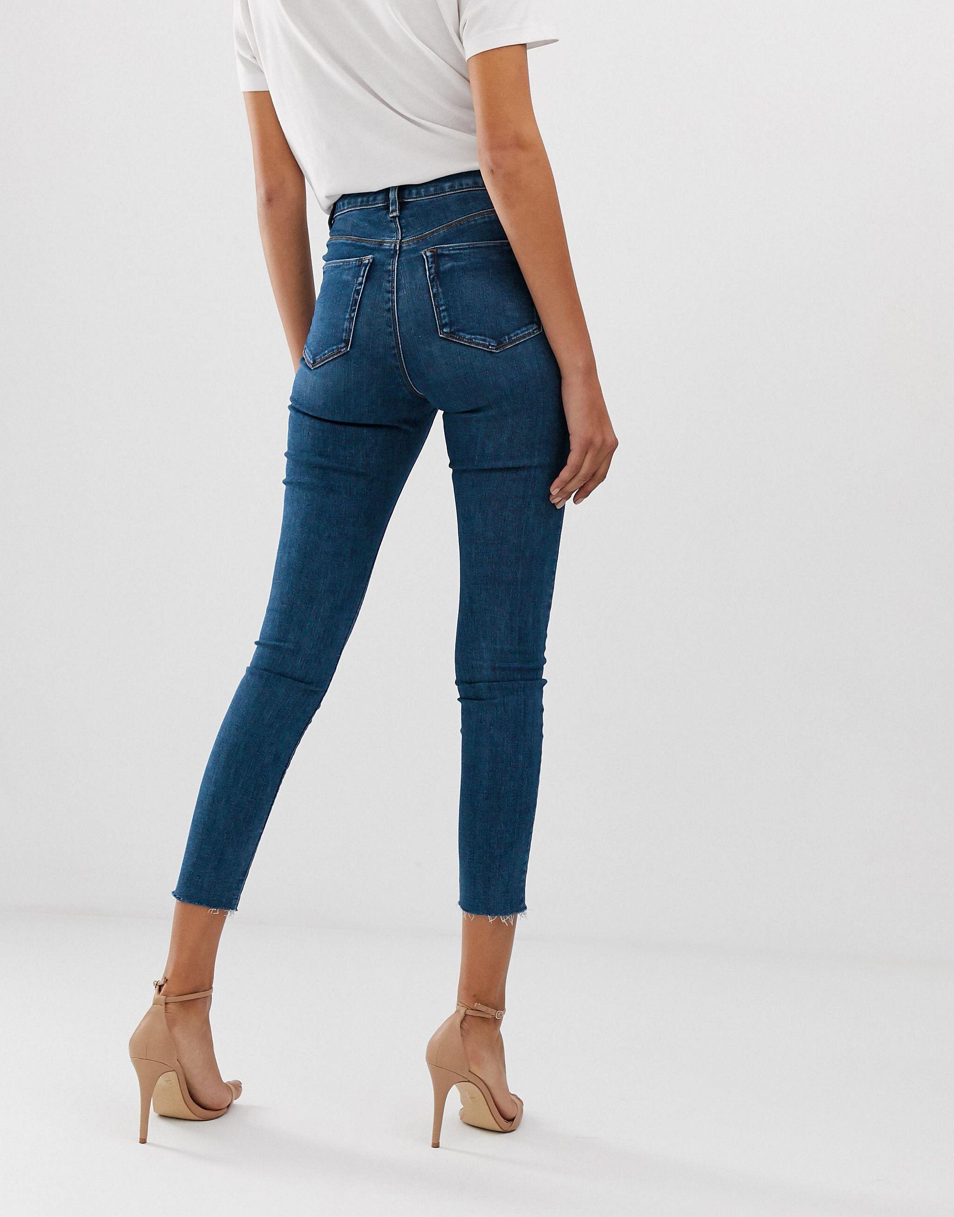 ASOS Denim Ridley High Waisted Skinny Jeans In Mid Wash Blue With Front ...