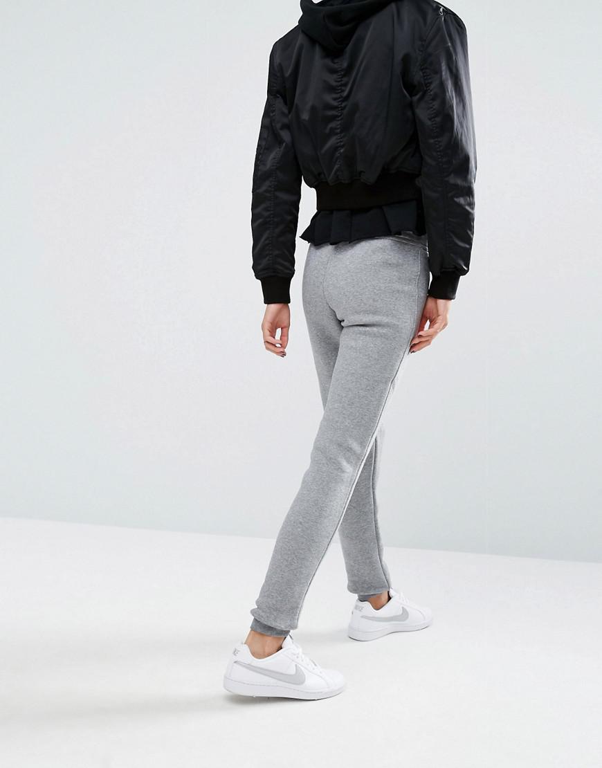 nike rally black swoosh logo slim fit joggers