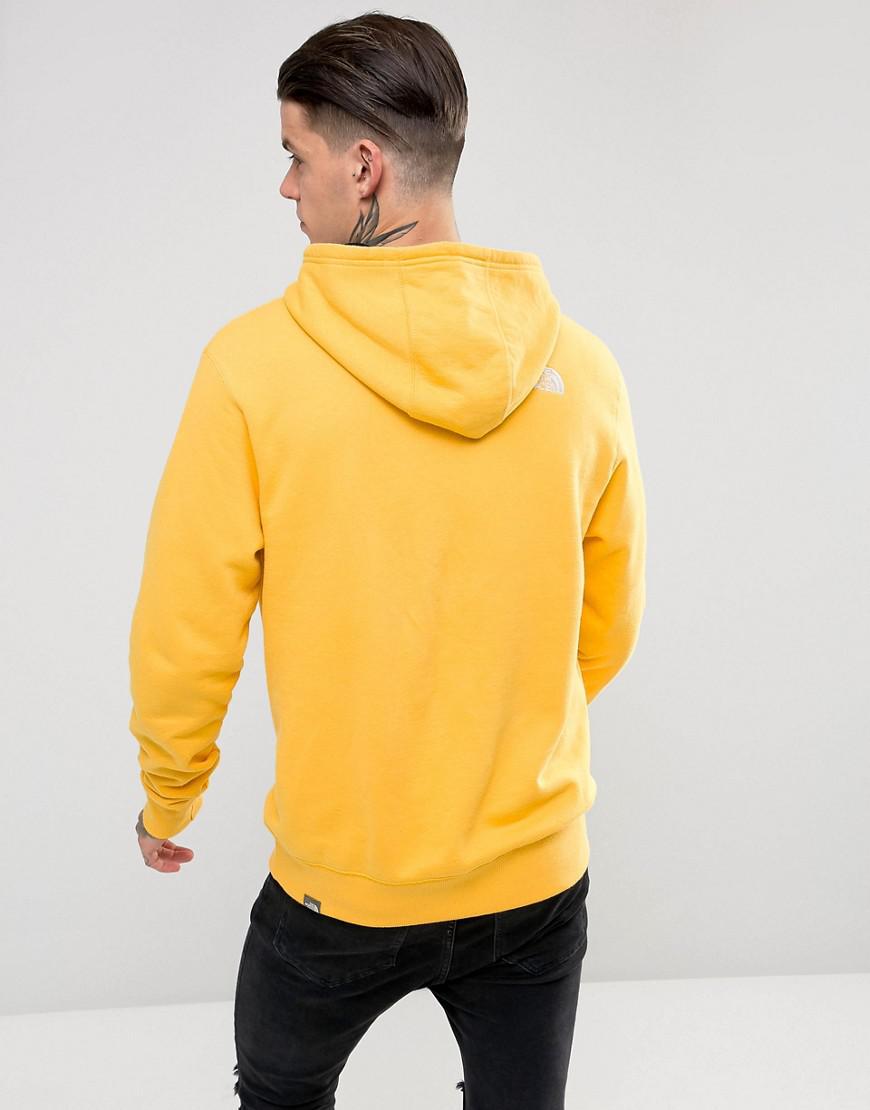 yellow the north face hoodie