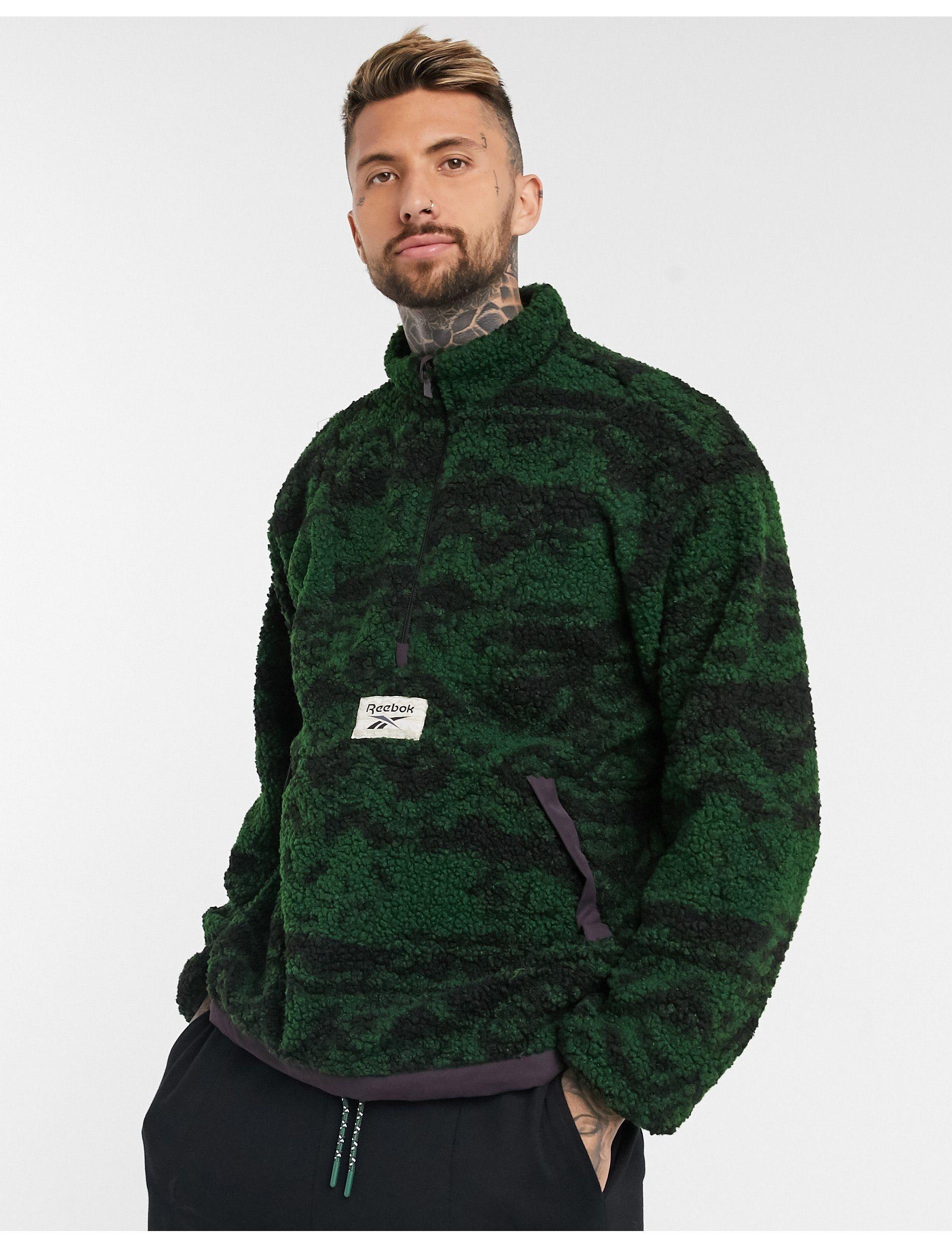 Reebok Veste polaire zip 1/4 Outwear - Noir | Reebok France