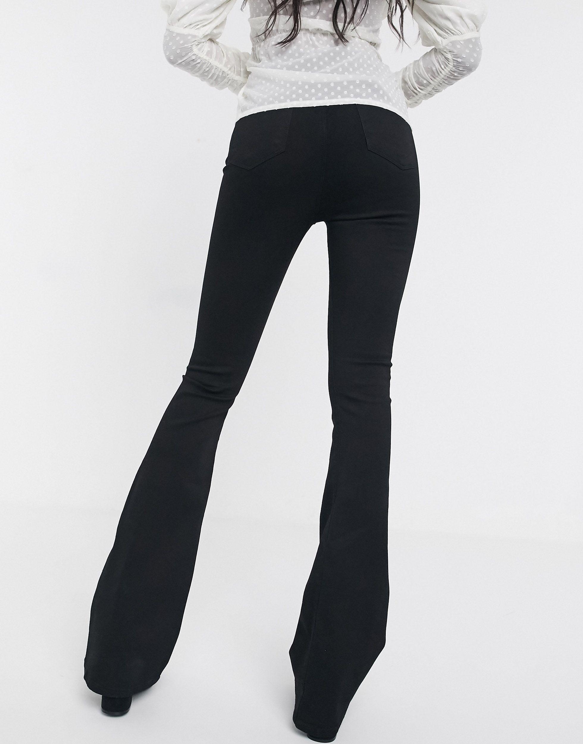 white flare jeans tall