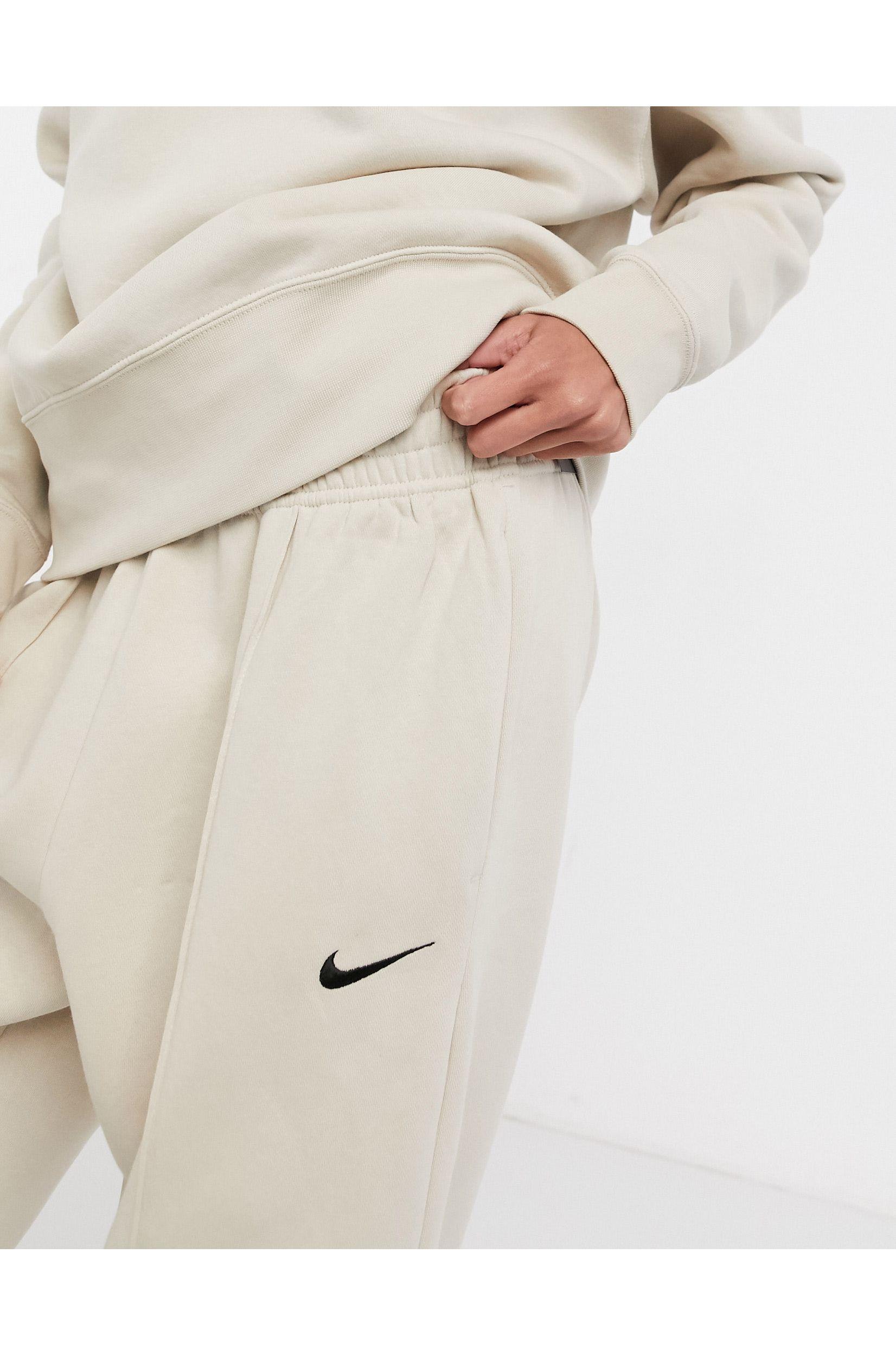 nike mini swoosh oversized gray sweatpants