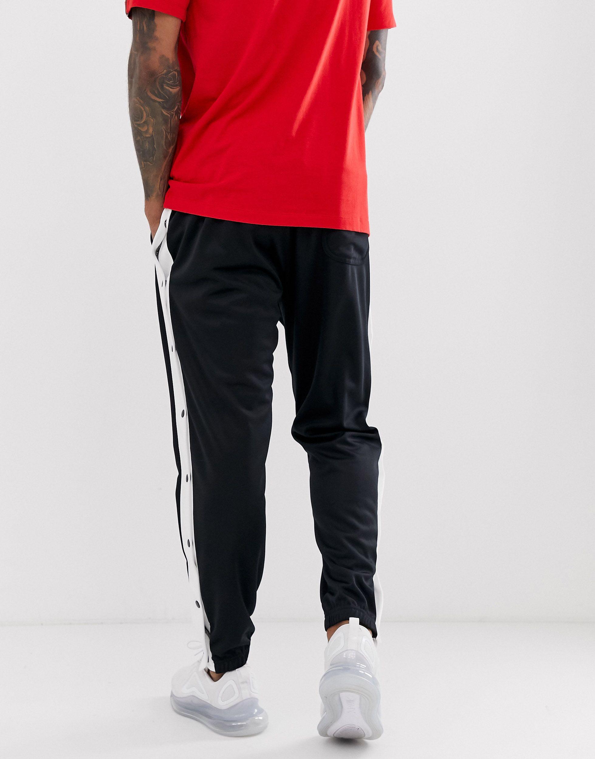 Nike Heritage Popper Polyknit joggers in Black for Men | Lyst UK