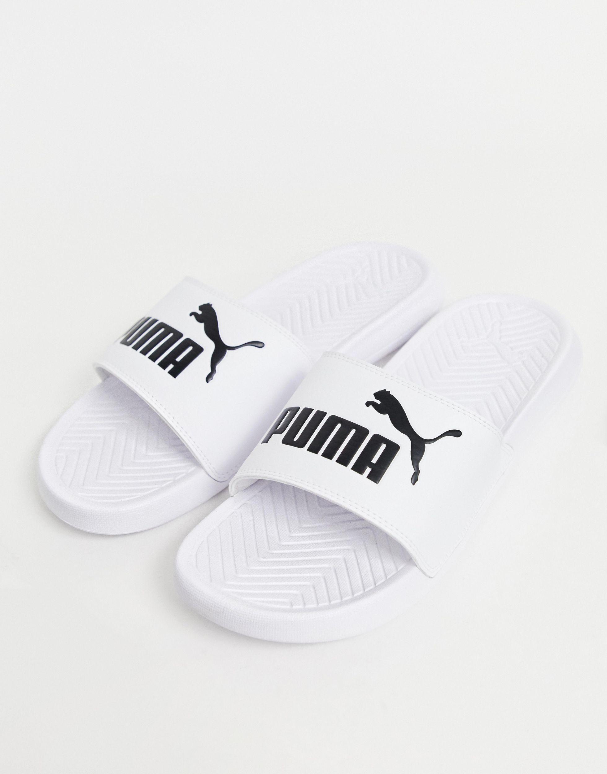 puma white sliders