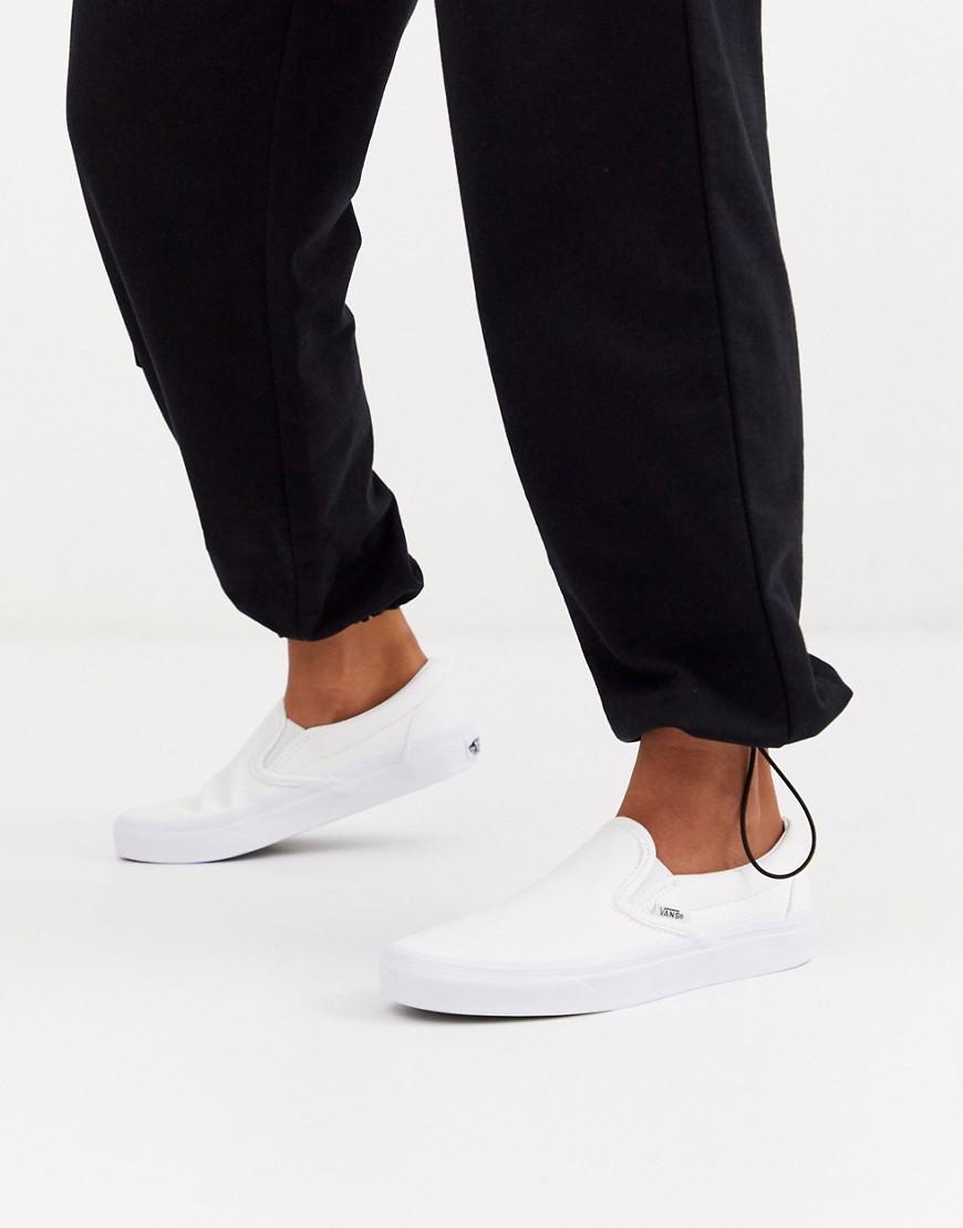 vans slip on triple white