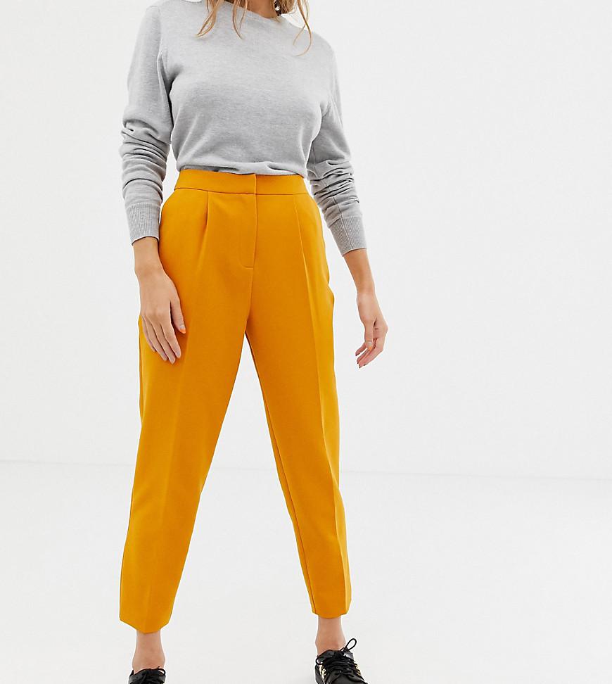 yellow tapered trousers