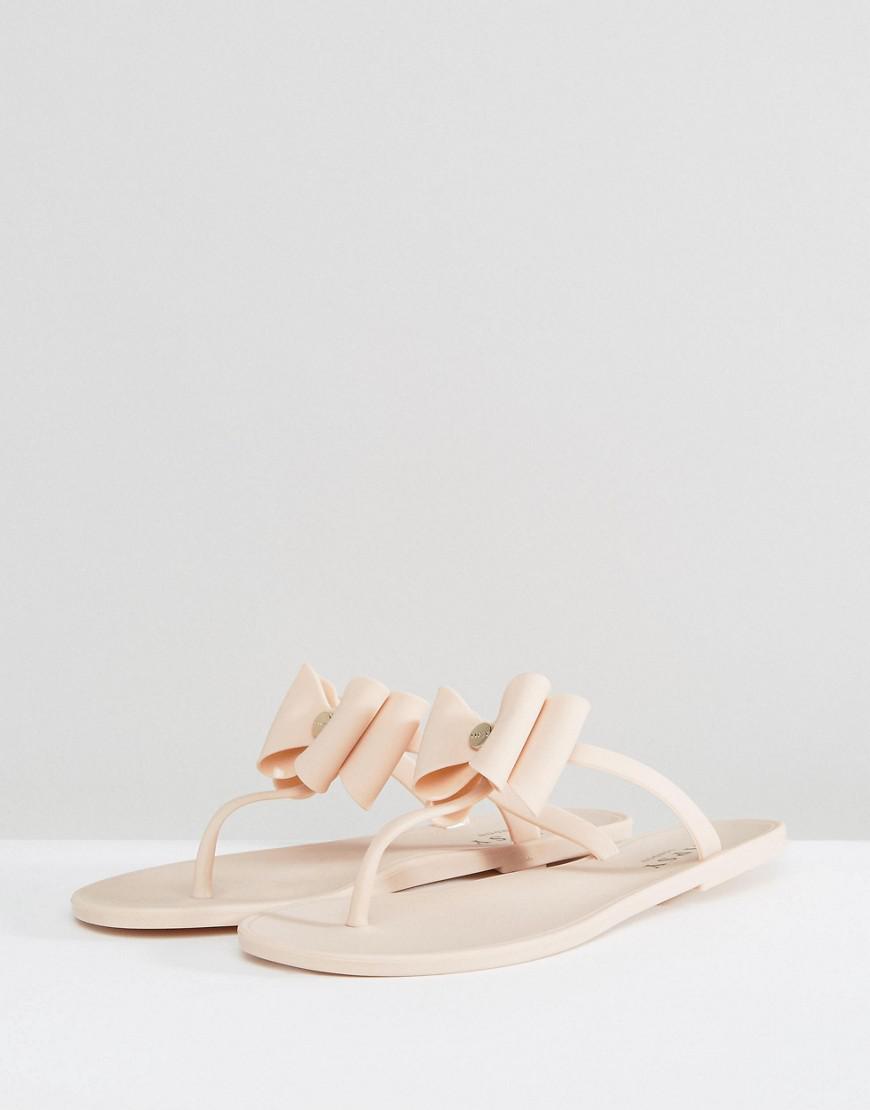 jelly flip flops with bow detail