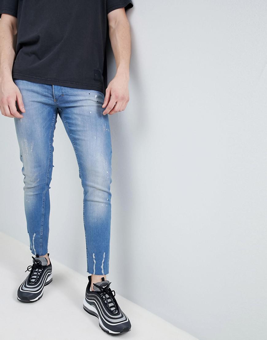 mens raw hem skinny jeans