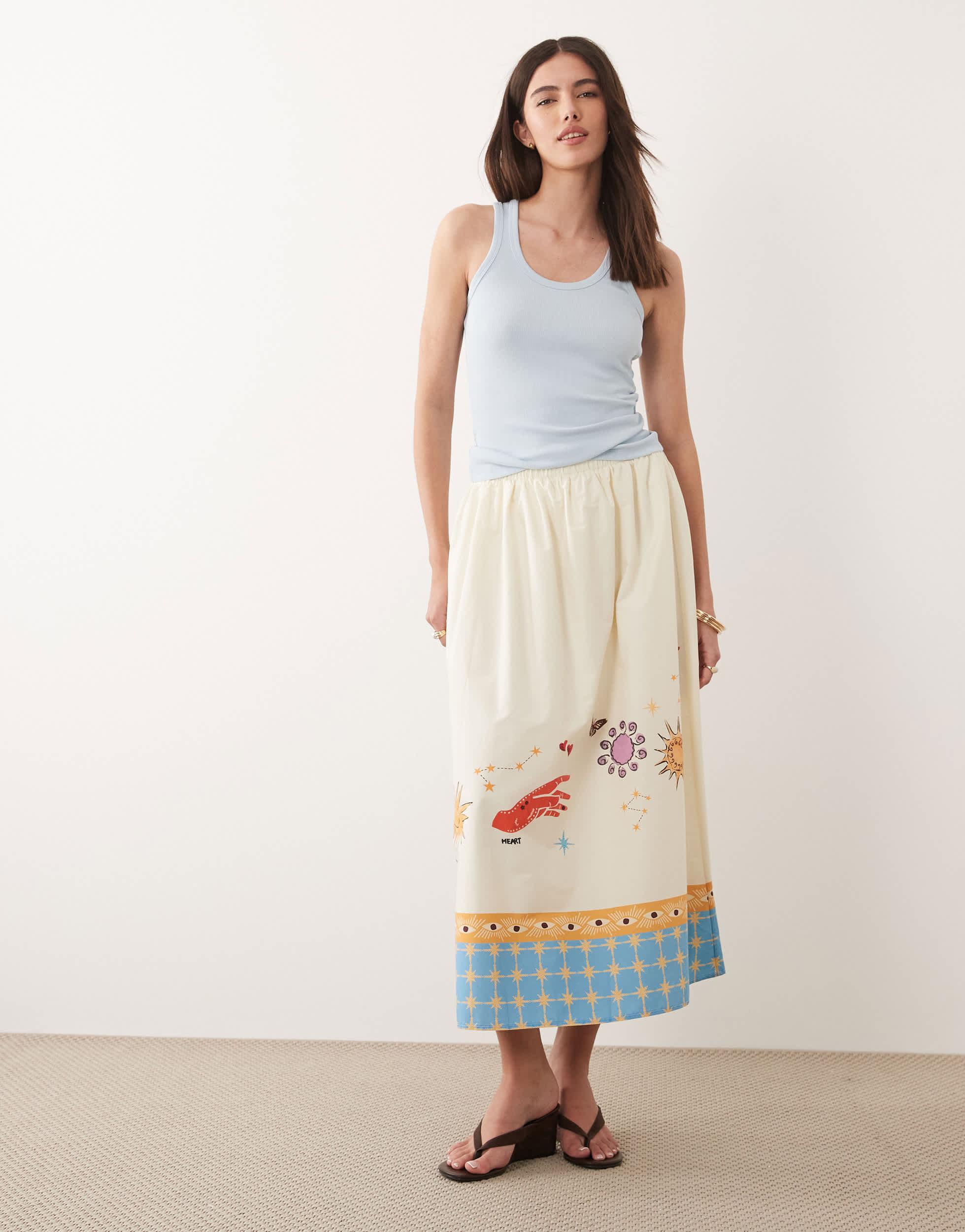 never fully dressed gold skirt Gold Snake Jaspre Wrap Skirt – Never Fully Dressed main image 1