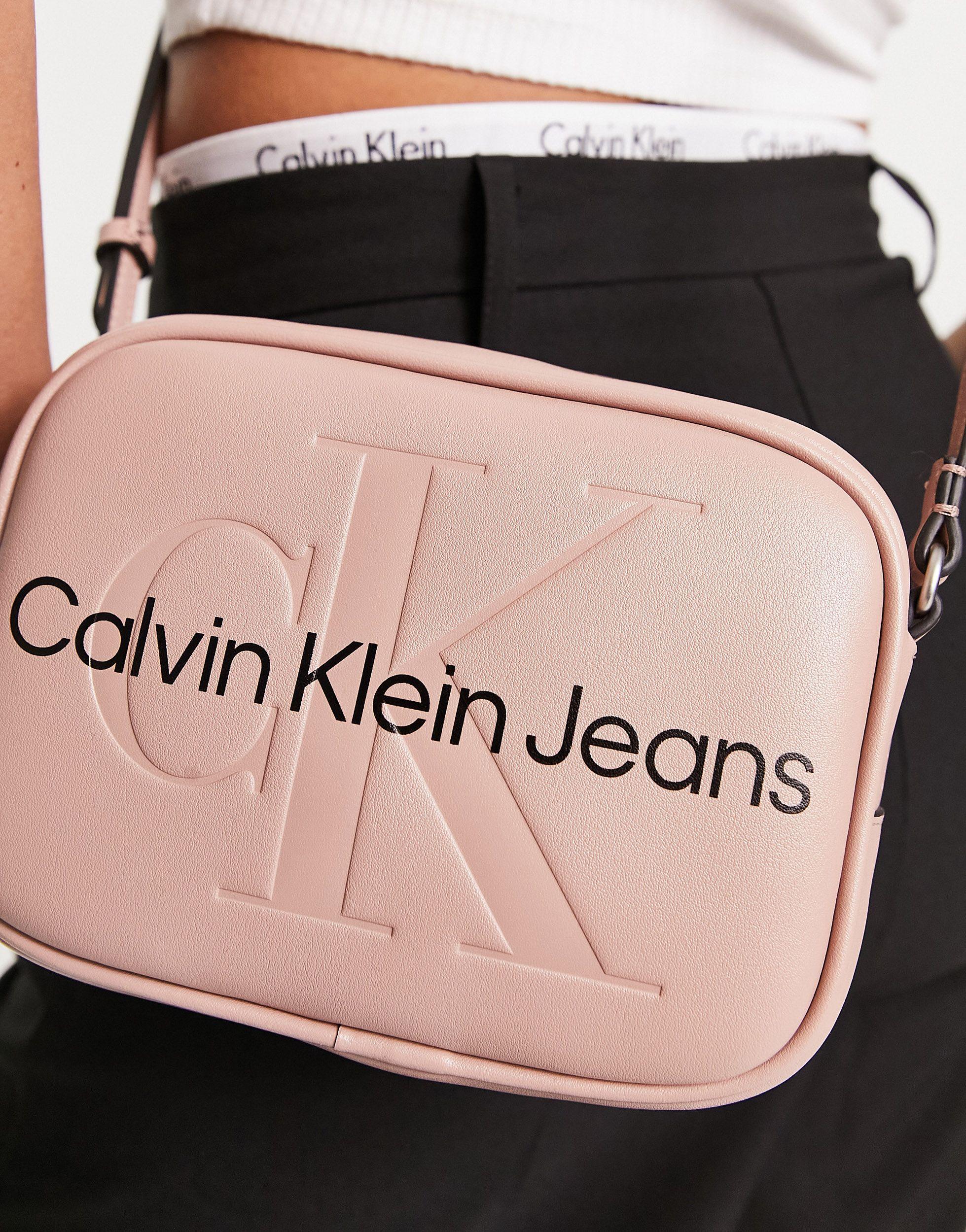 Calvin Klein Sculpt Cross Body Logo Camera Bag, Ancient White at John Lewis  & Partners