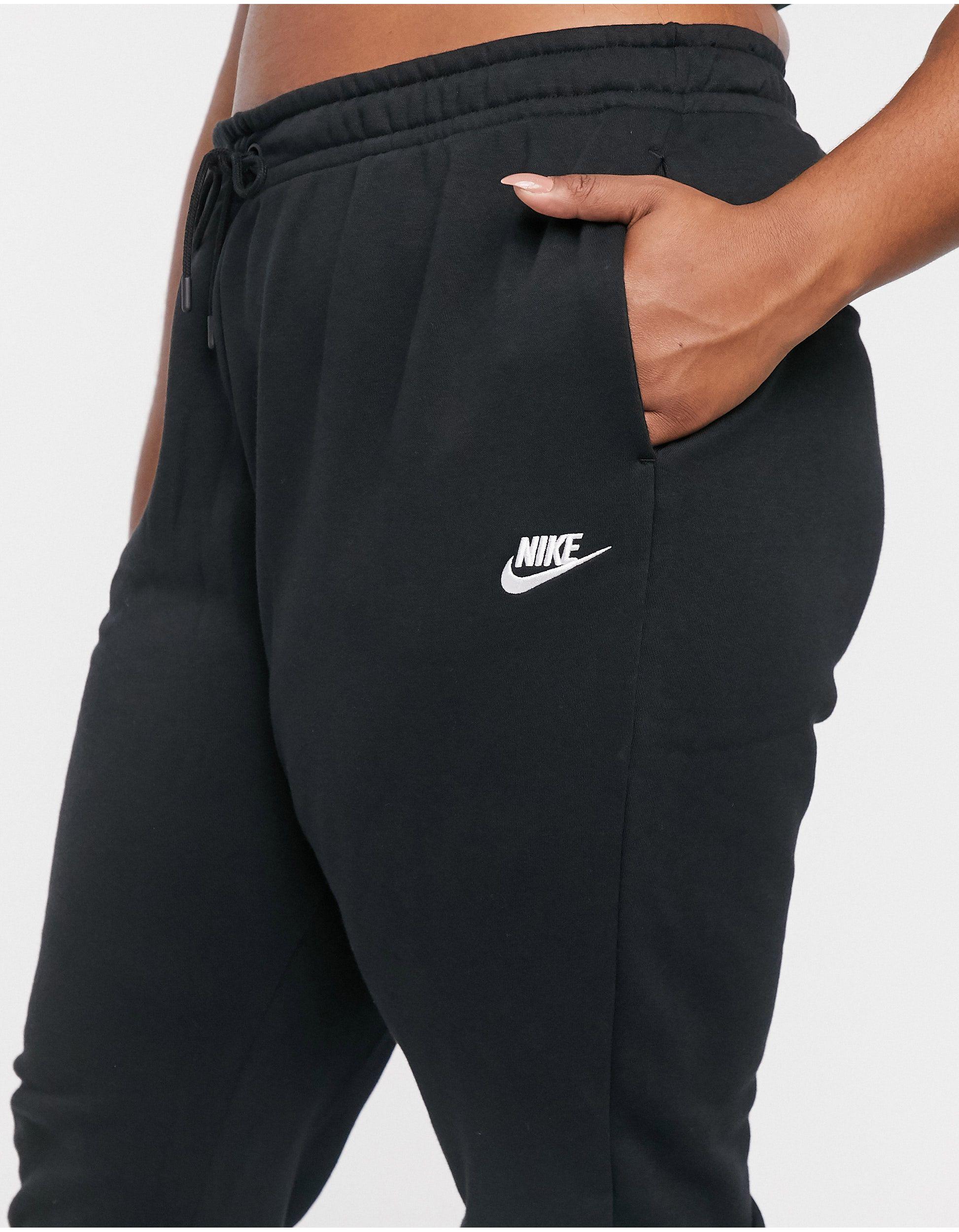 Nike Cotton Plus Black Essentials joggers - Lyst