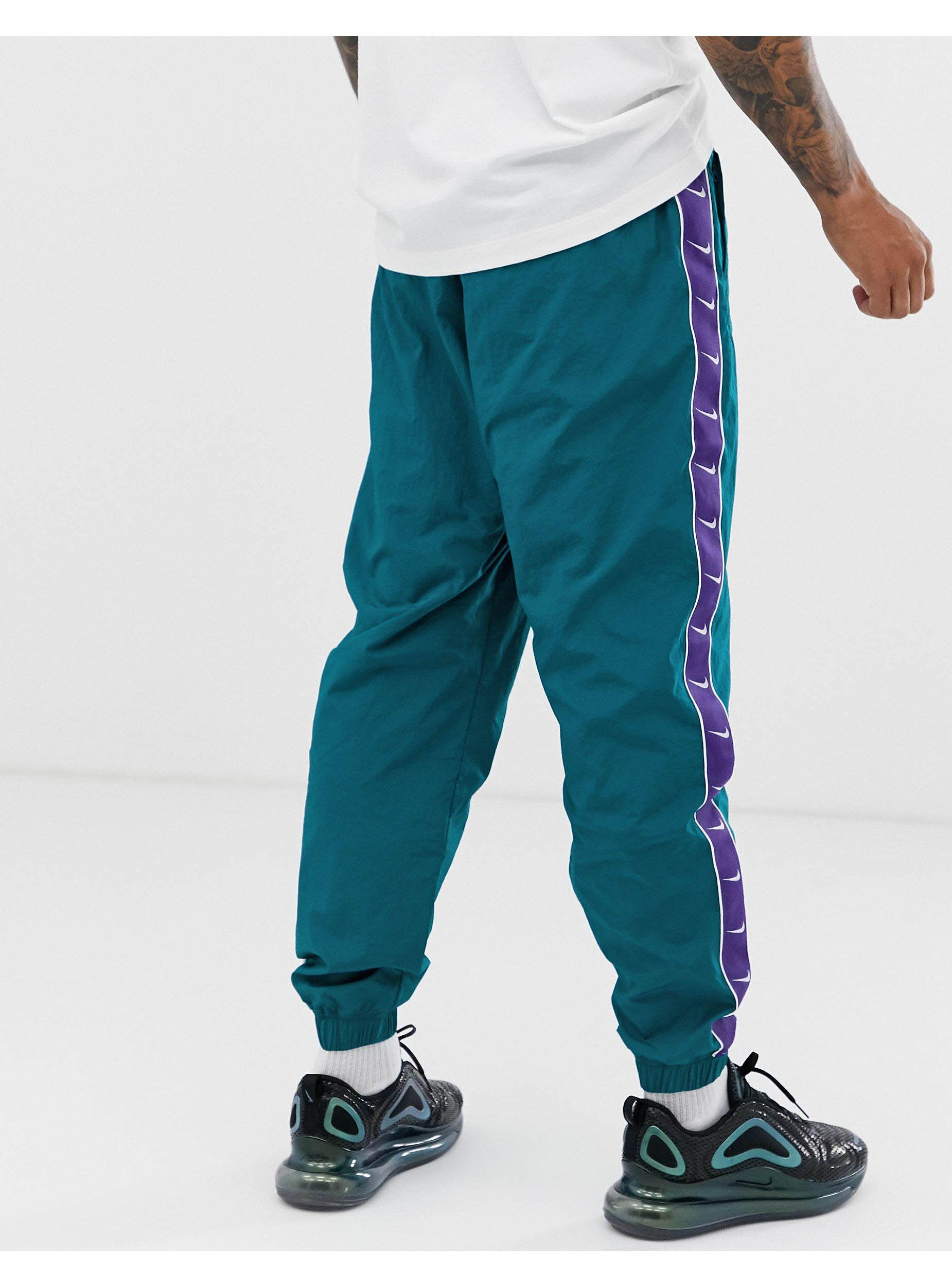 Pantalones Nike de Tejido sintético de color Verde para hombre | Lyst