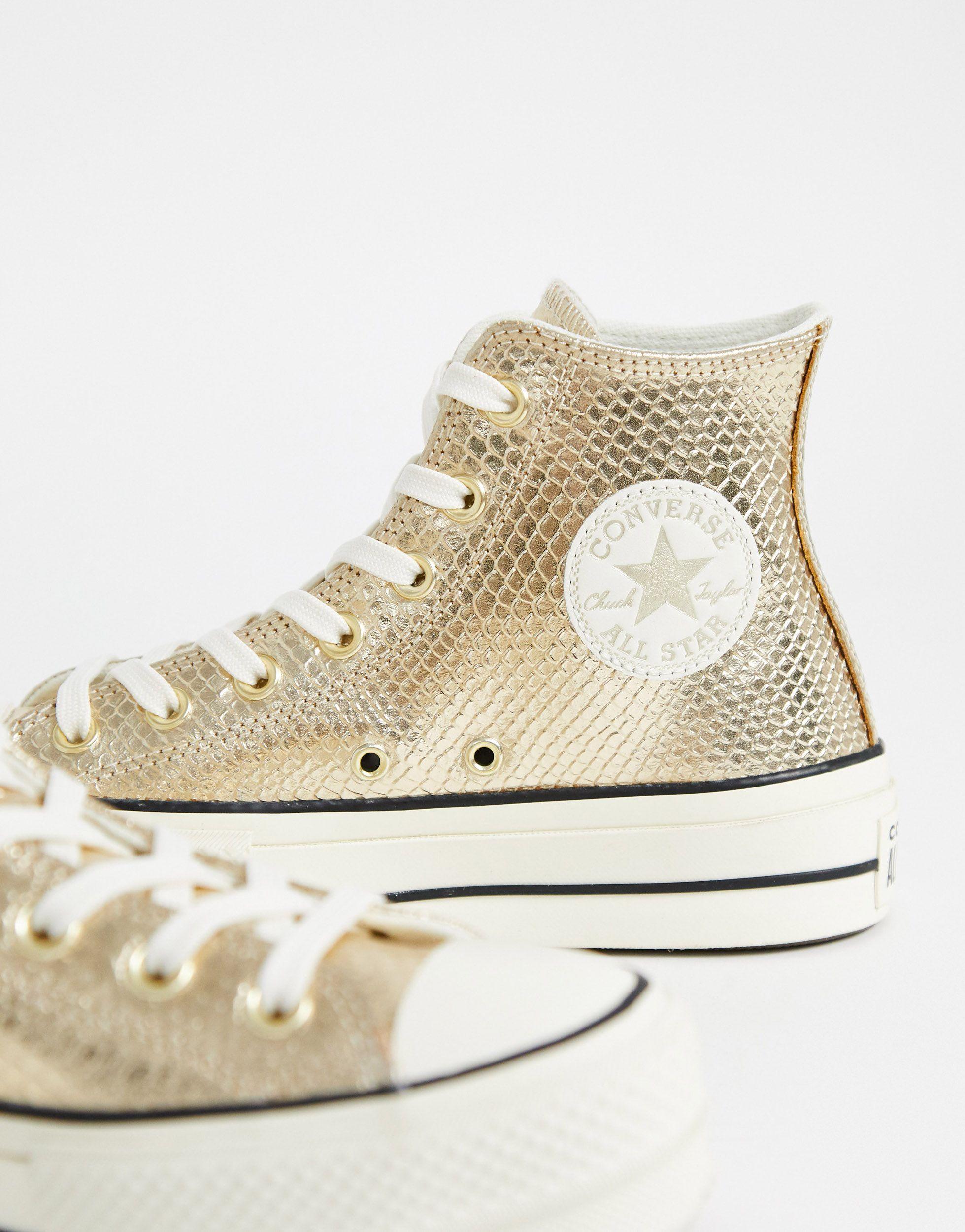 Chuck Taylor - Sneakers alte con plateau oro pitonato di Converse in  Metallizzato | Lyst