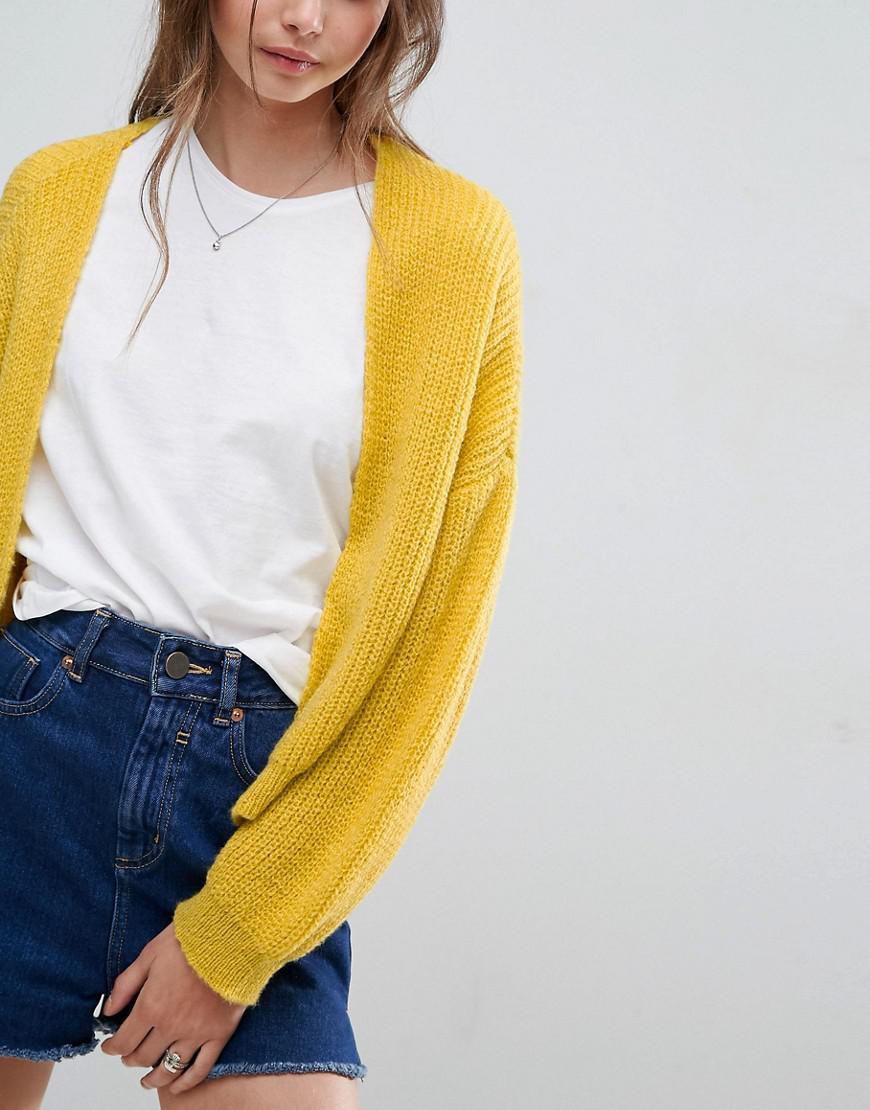 yellow fuzzy cardigan