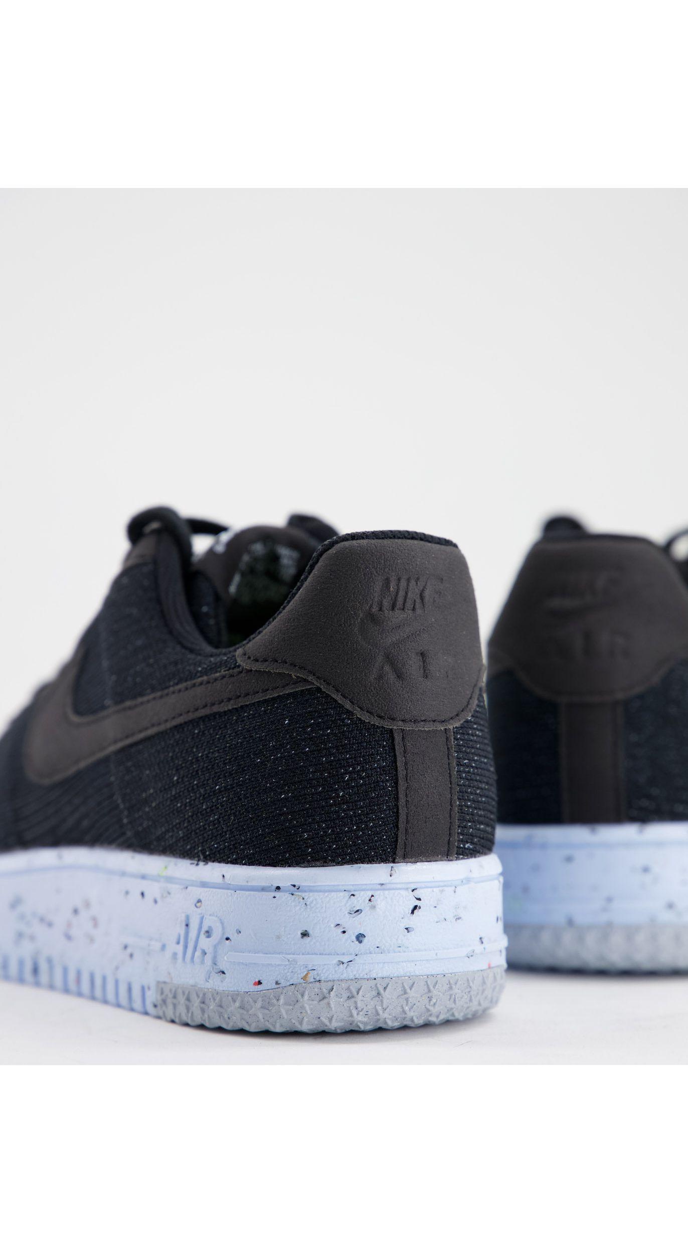 nike airforce 1 crater flyknit trainers in grey