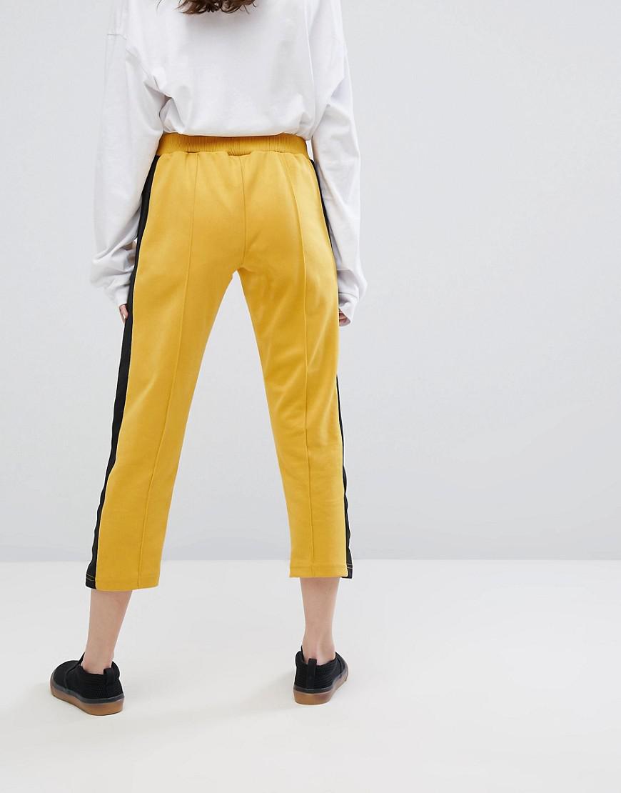 yellow tracksuit bottoms