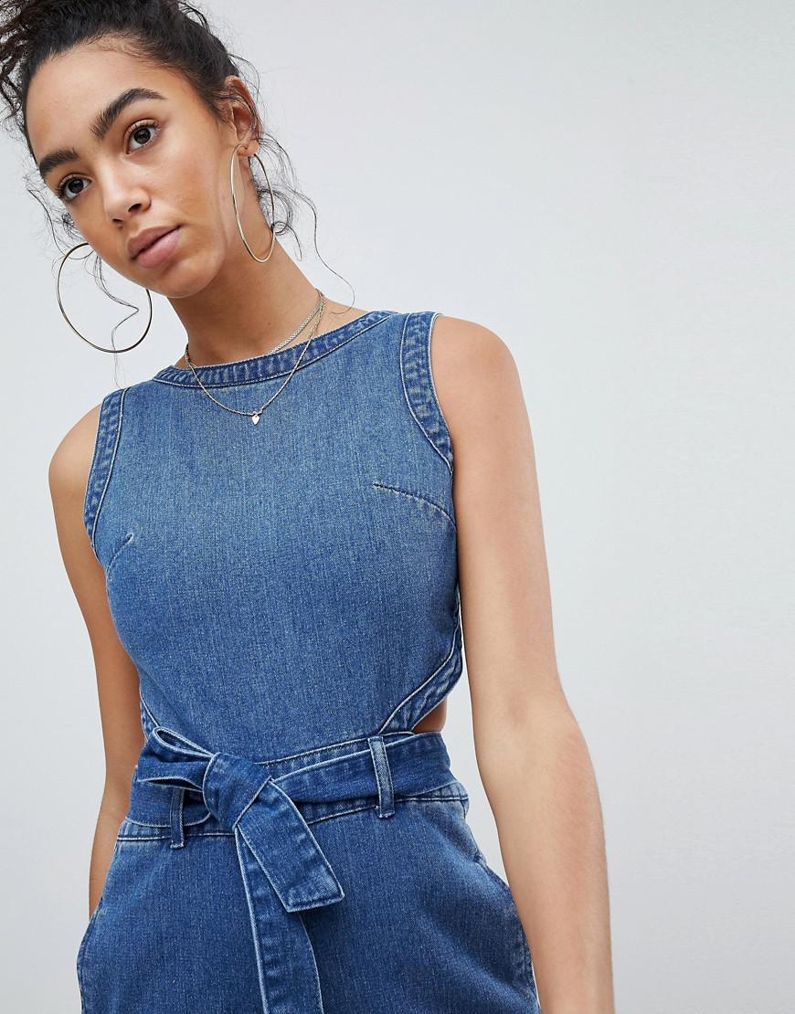 missguided cut out denim jumpsuit in blue