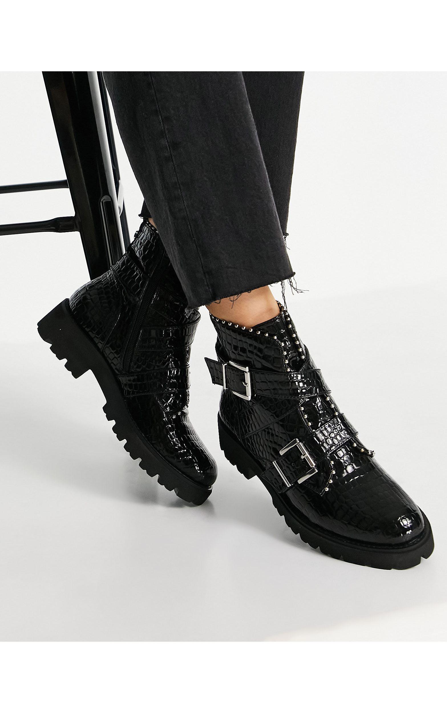 Botas negras planas con efecto cocodrilo, suela gruesa y detalle Steve  Madden de color Negro | Lyst