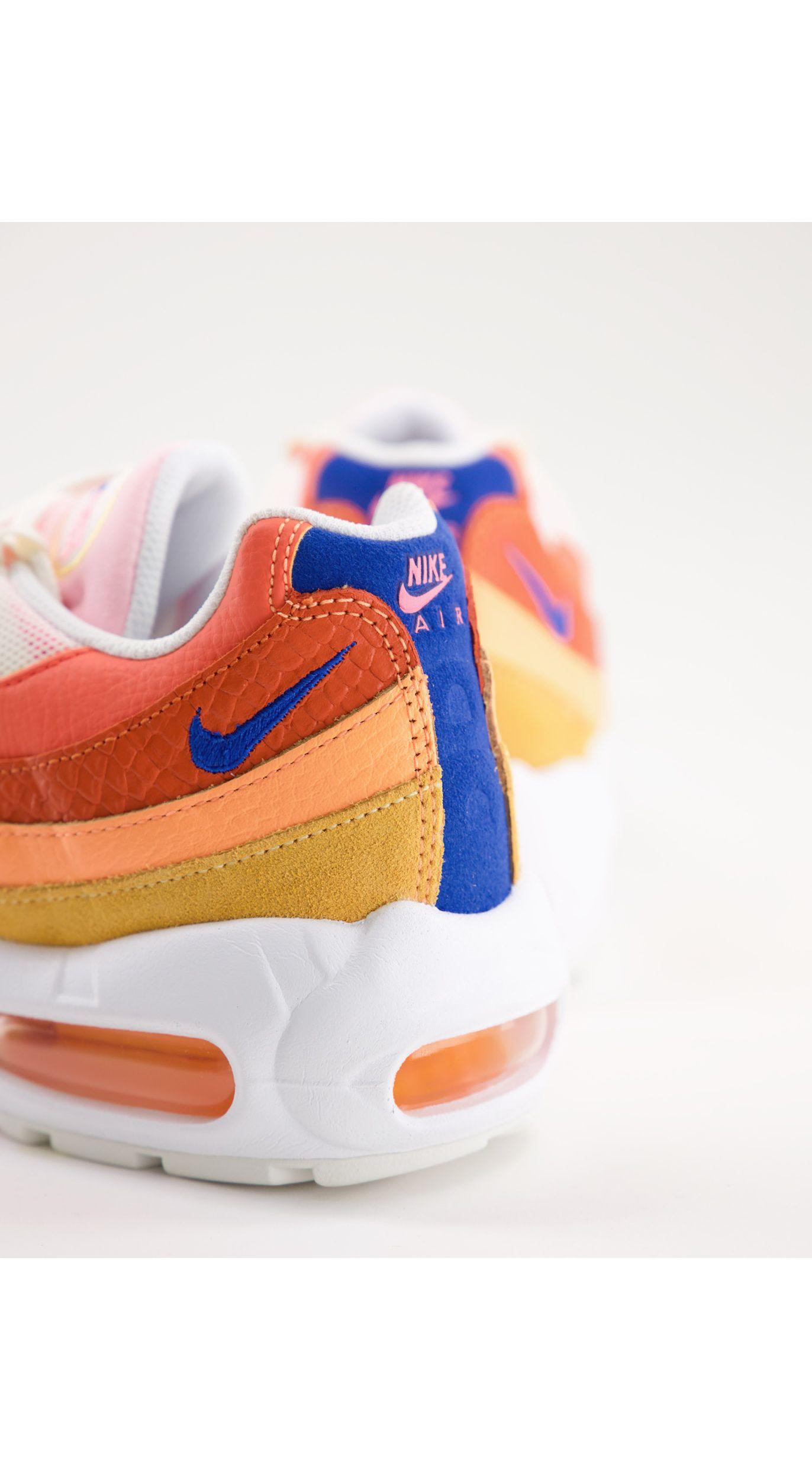 nike air max 95 tm trainers in white and orange