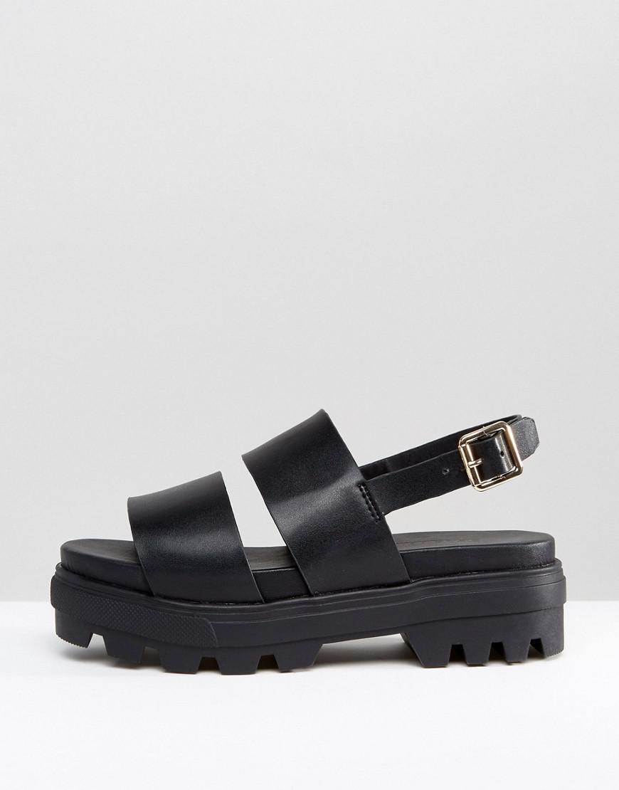 white chunky flat sandals