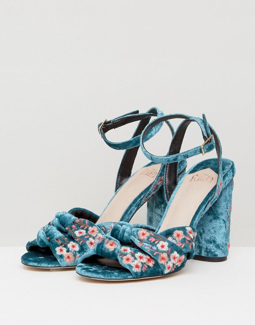blue embroidered heels