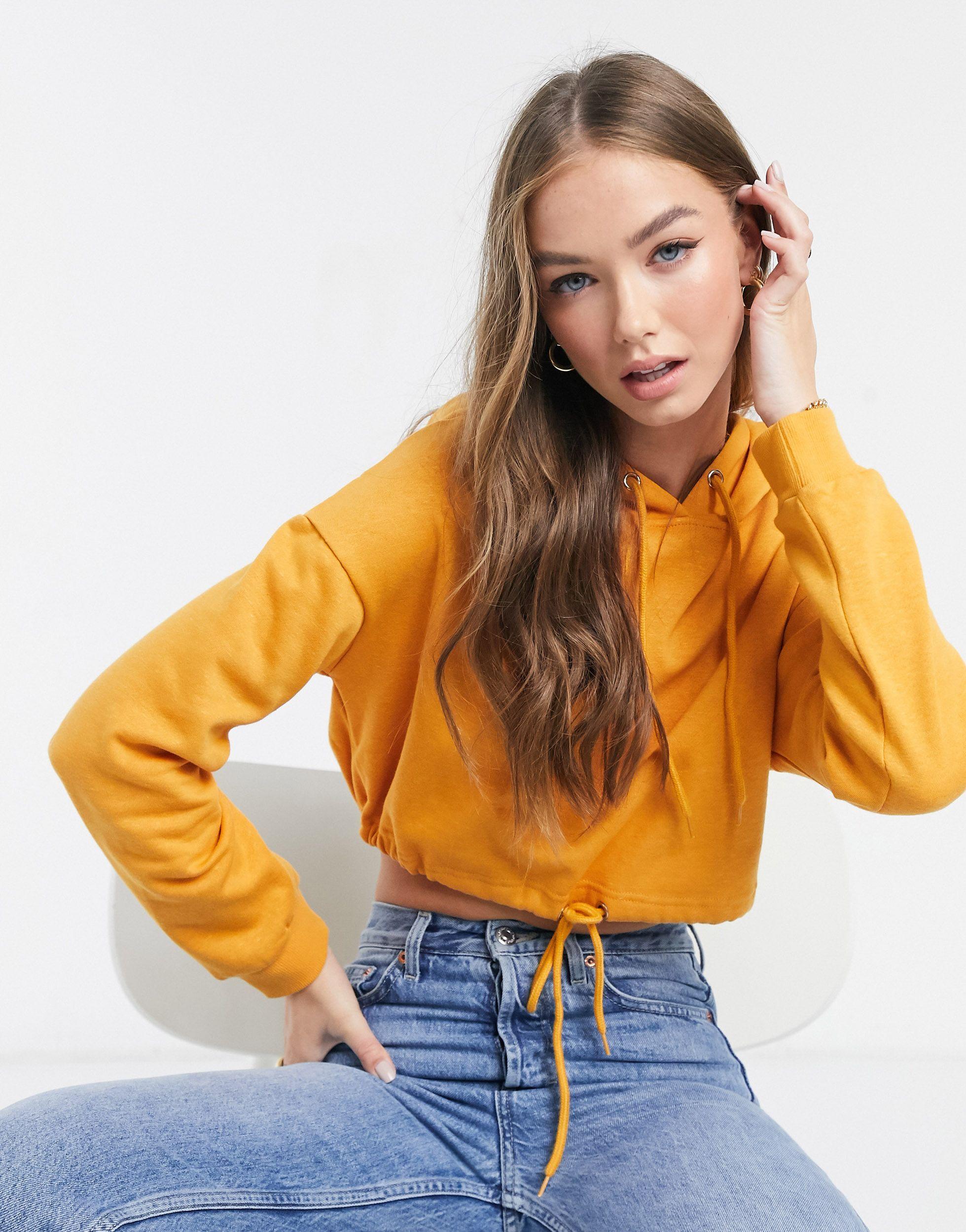cropped yellow sweatshirt