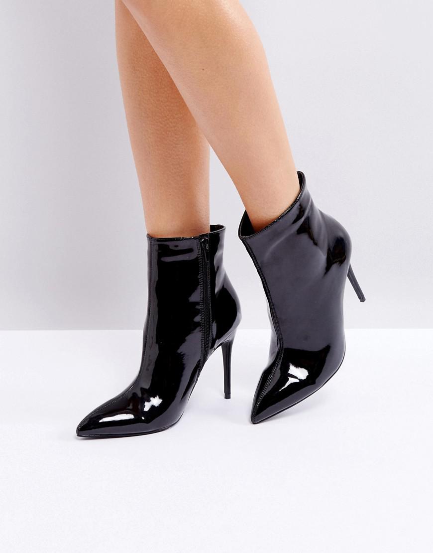 black pointed heeled ankle boots