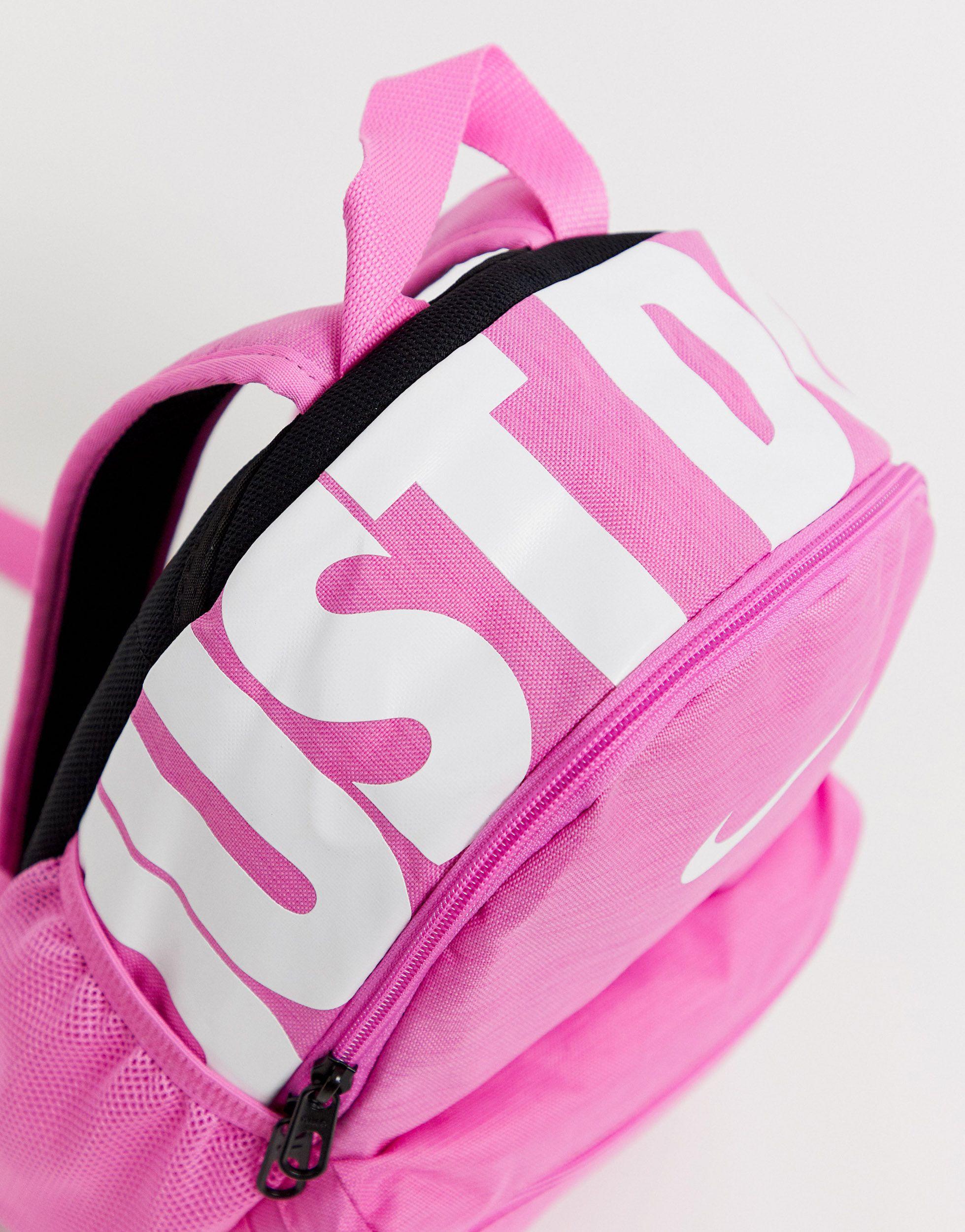 Nike pink just do it best sale mini backpack