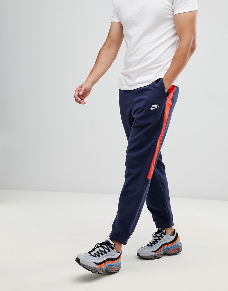 nike joggers side stripe