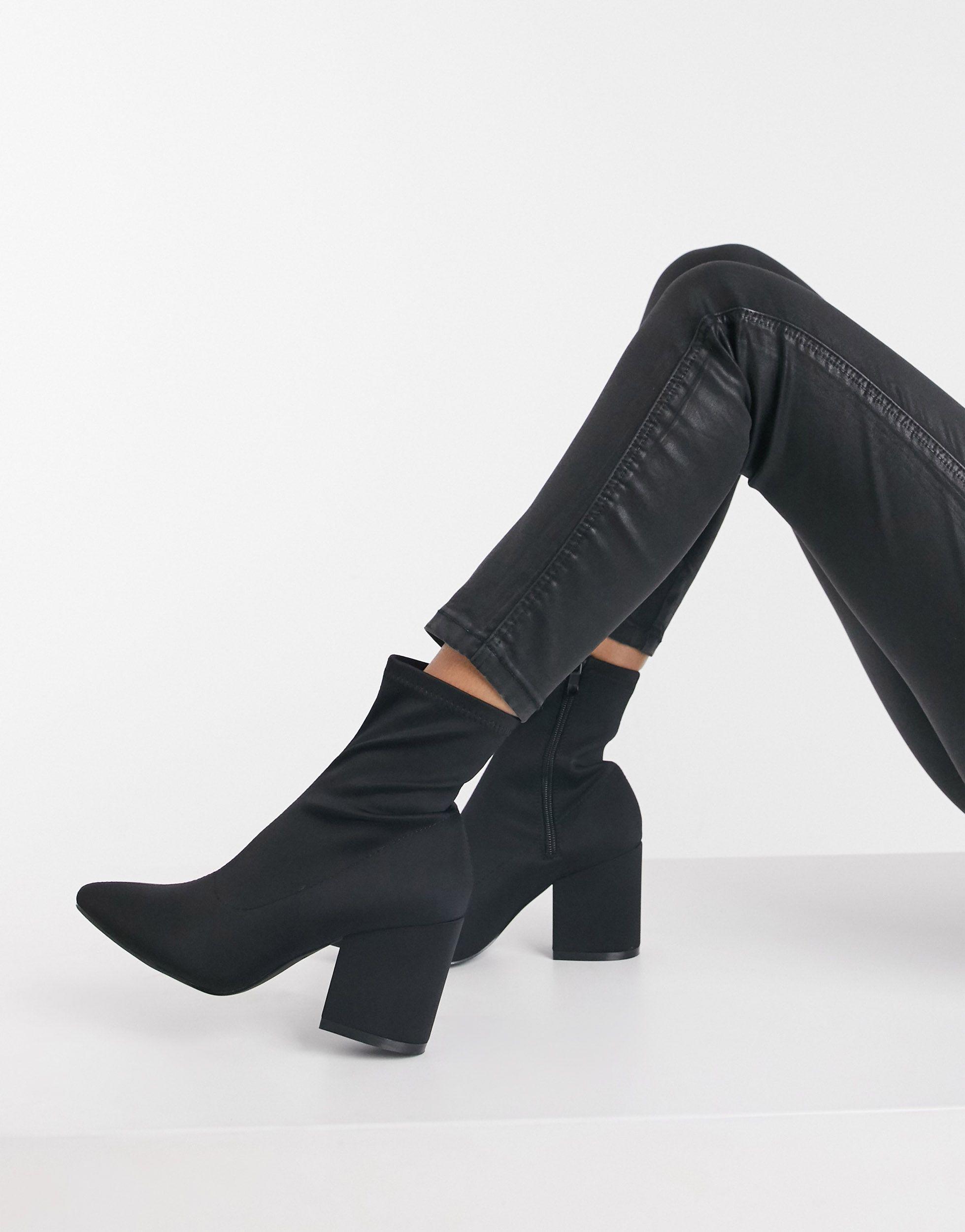 Black pull outlet on sock boots
