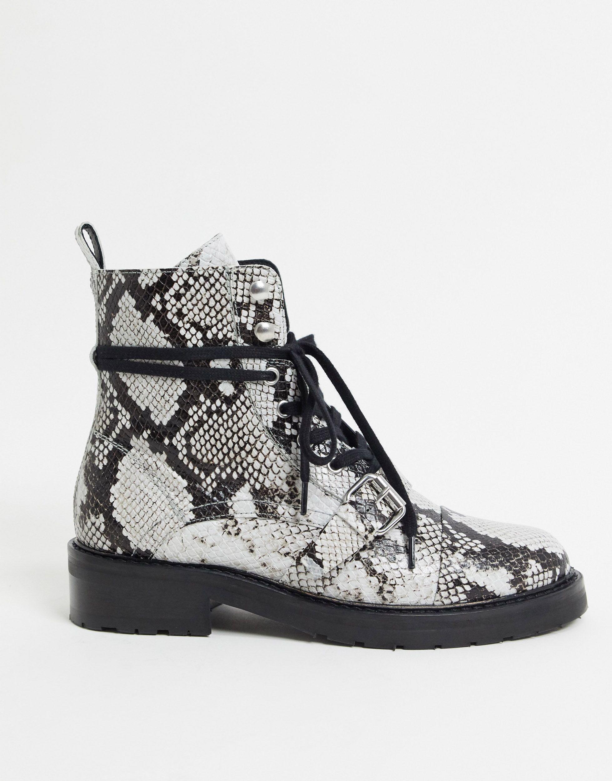 black and white snake boots