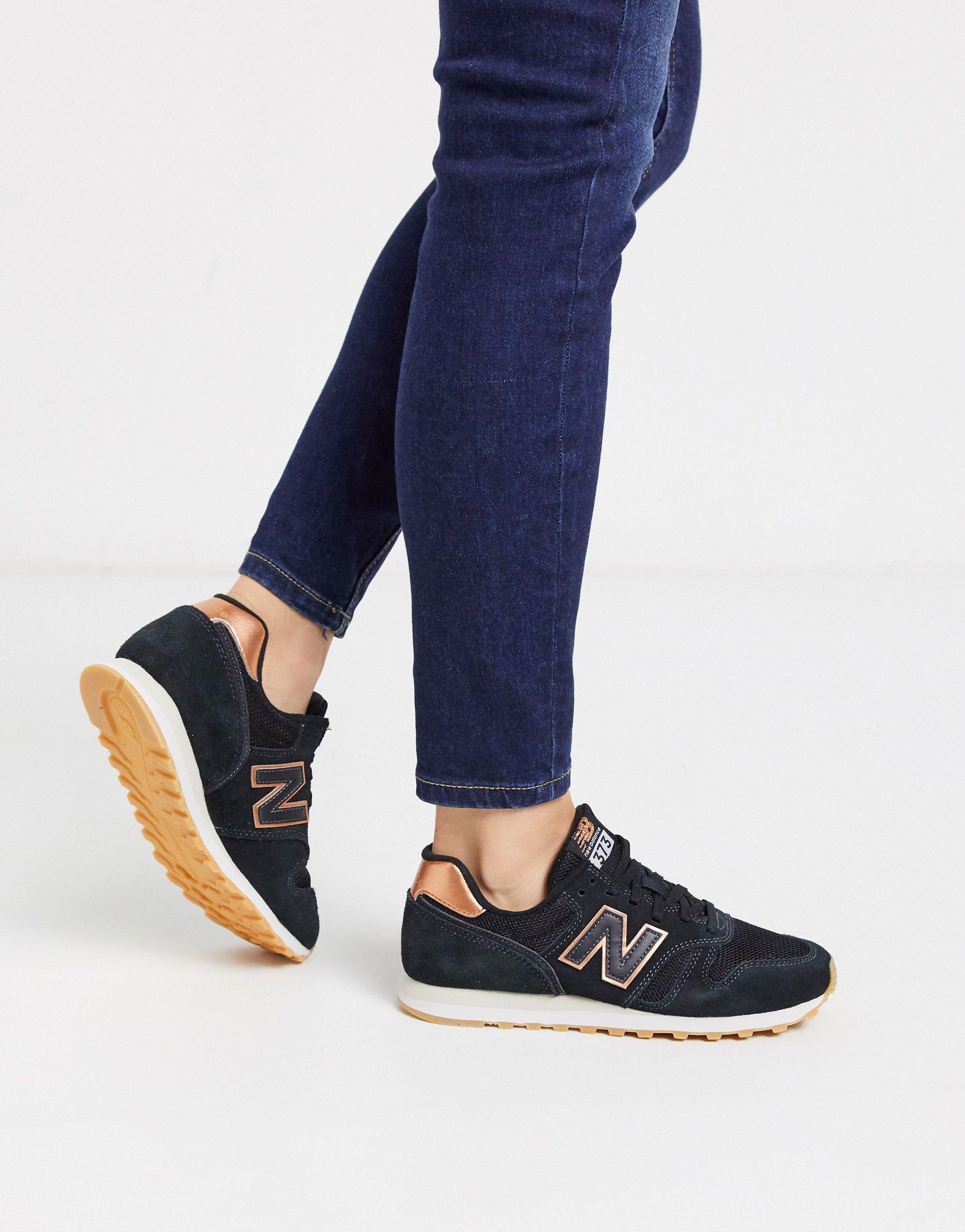 new balance 373 black orange