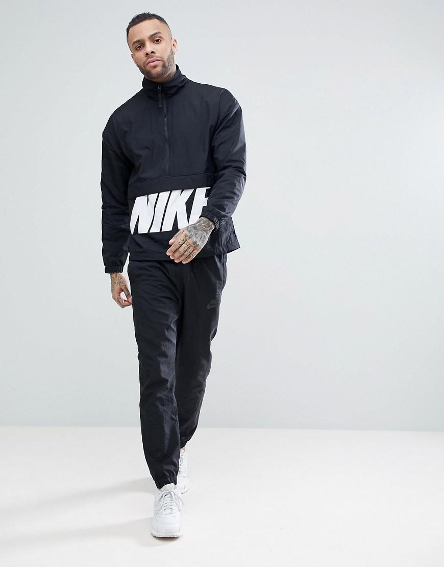black nike tracksuit set