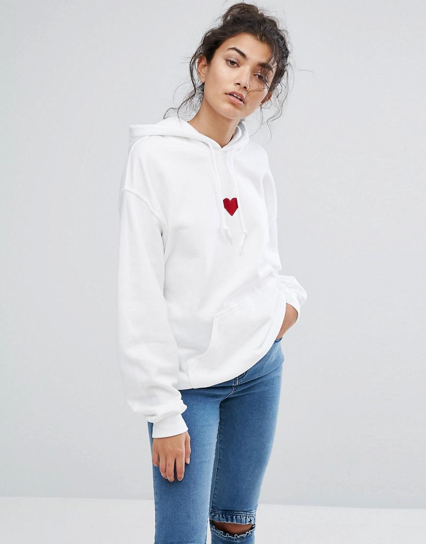 red sweatshirt with white heart