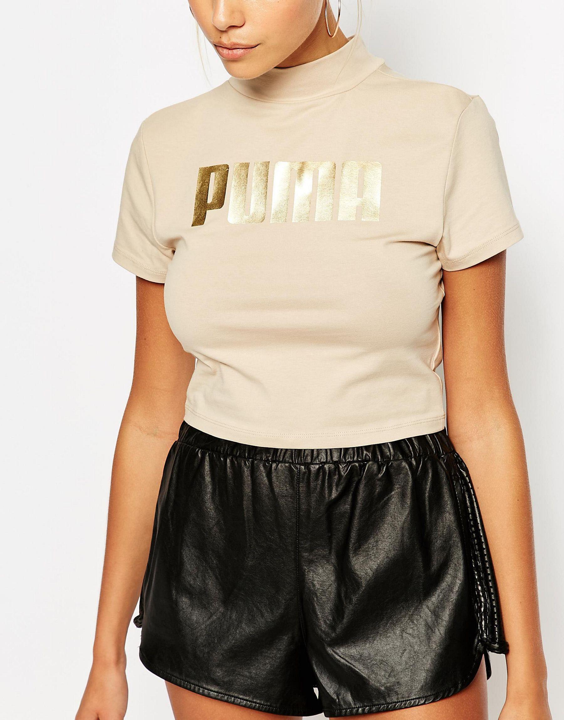 gold puma shirt