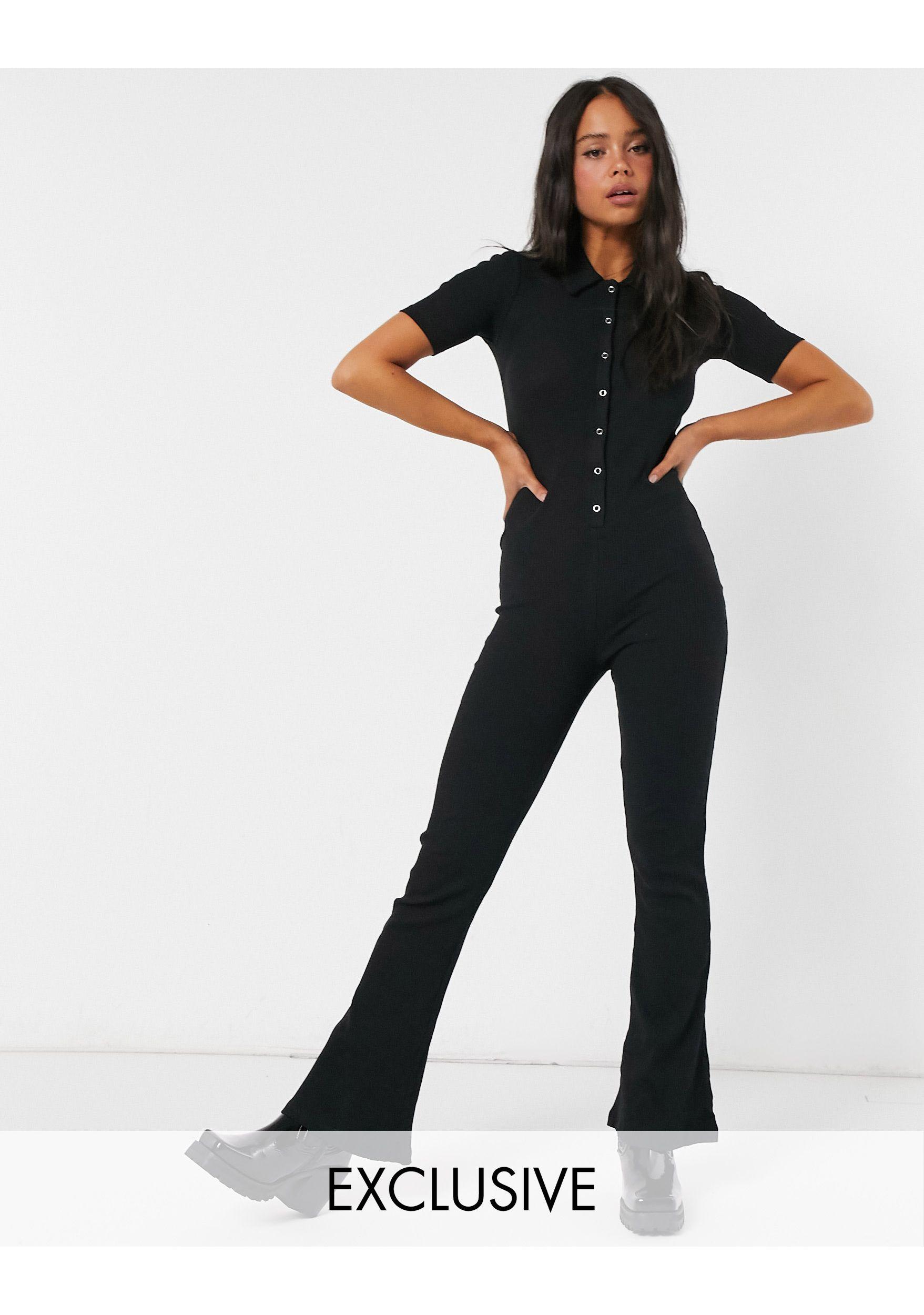 Reclaimed (vintage) Cotton Inspired Ribbed Flared Jumpsuit in Black - Lyst