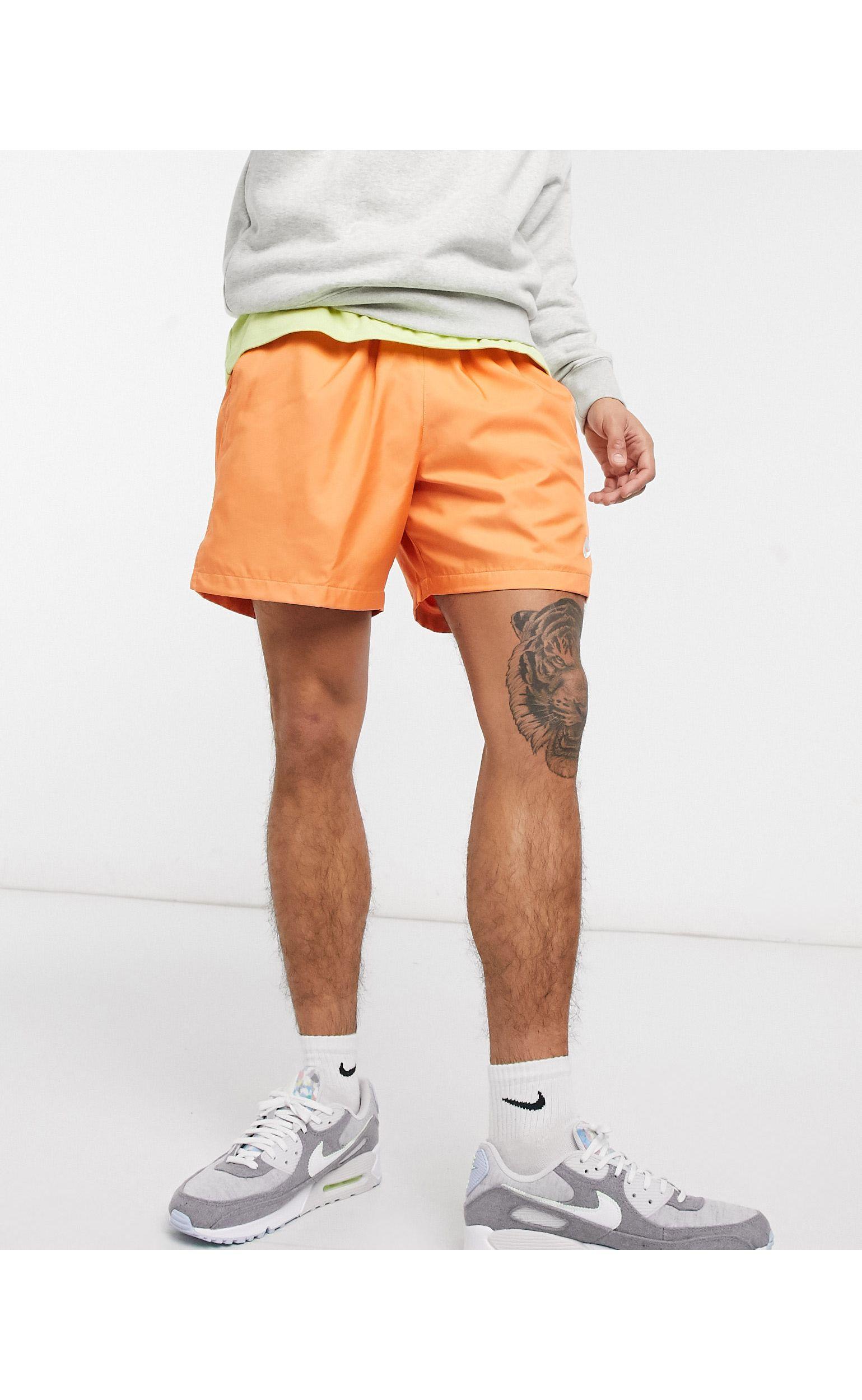 Nike Synthetic Club Essentials Woven Flow Shorts in Orange for Men | Lyst