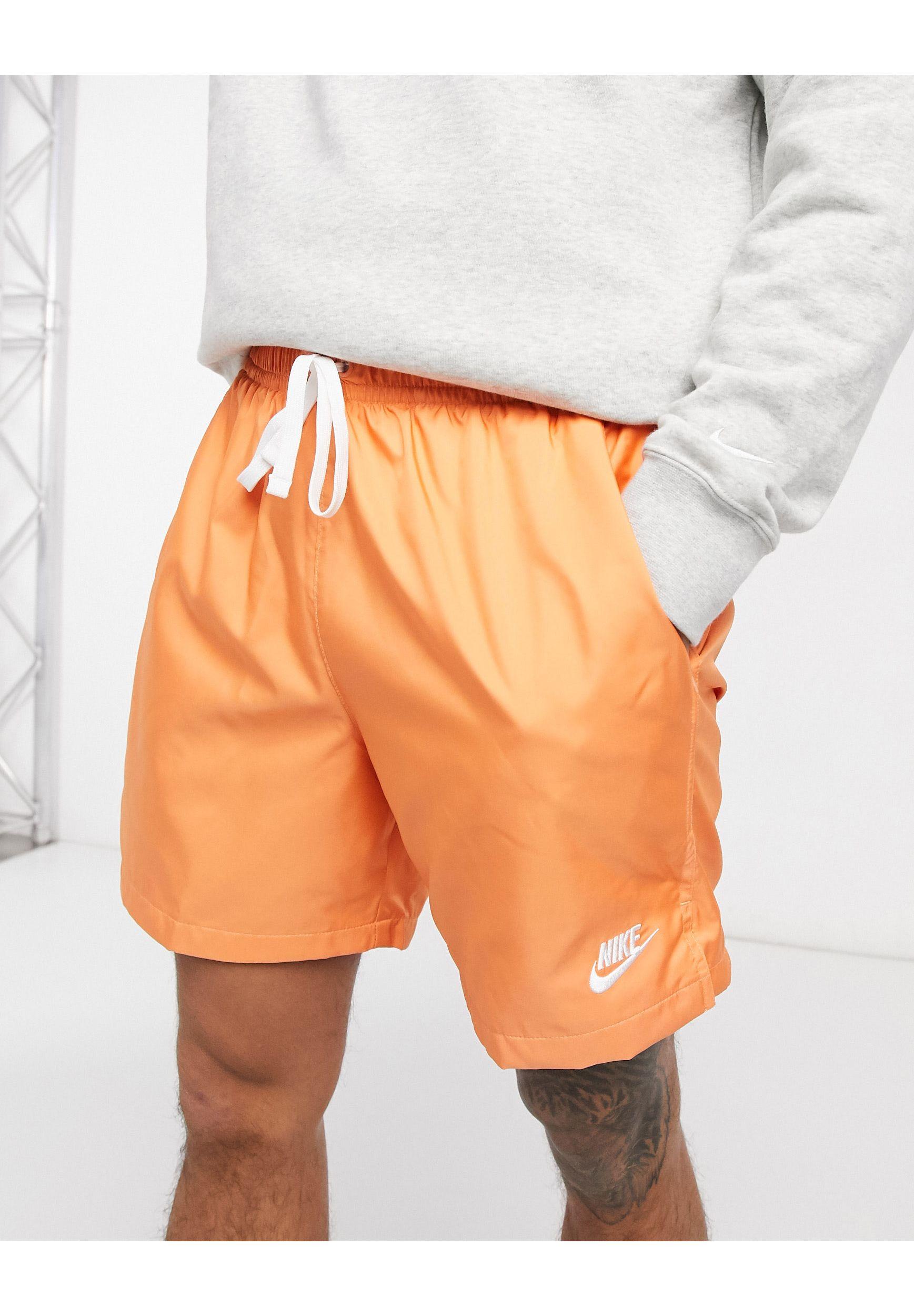 Nike Club Essentials Woven Flow Shorts in Orange for Men | Lyst