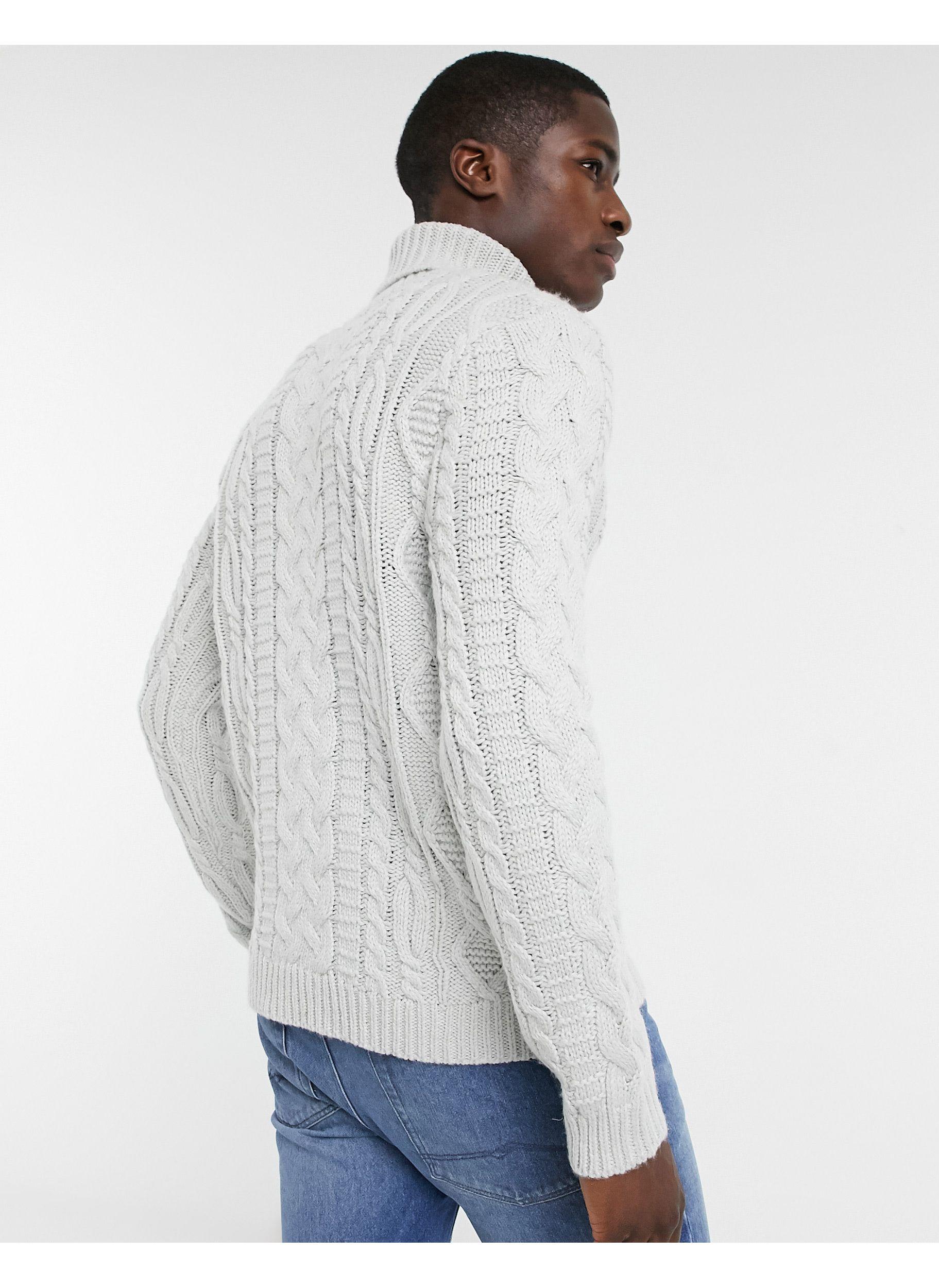 roll neck cable knit sweater