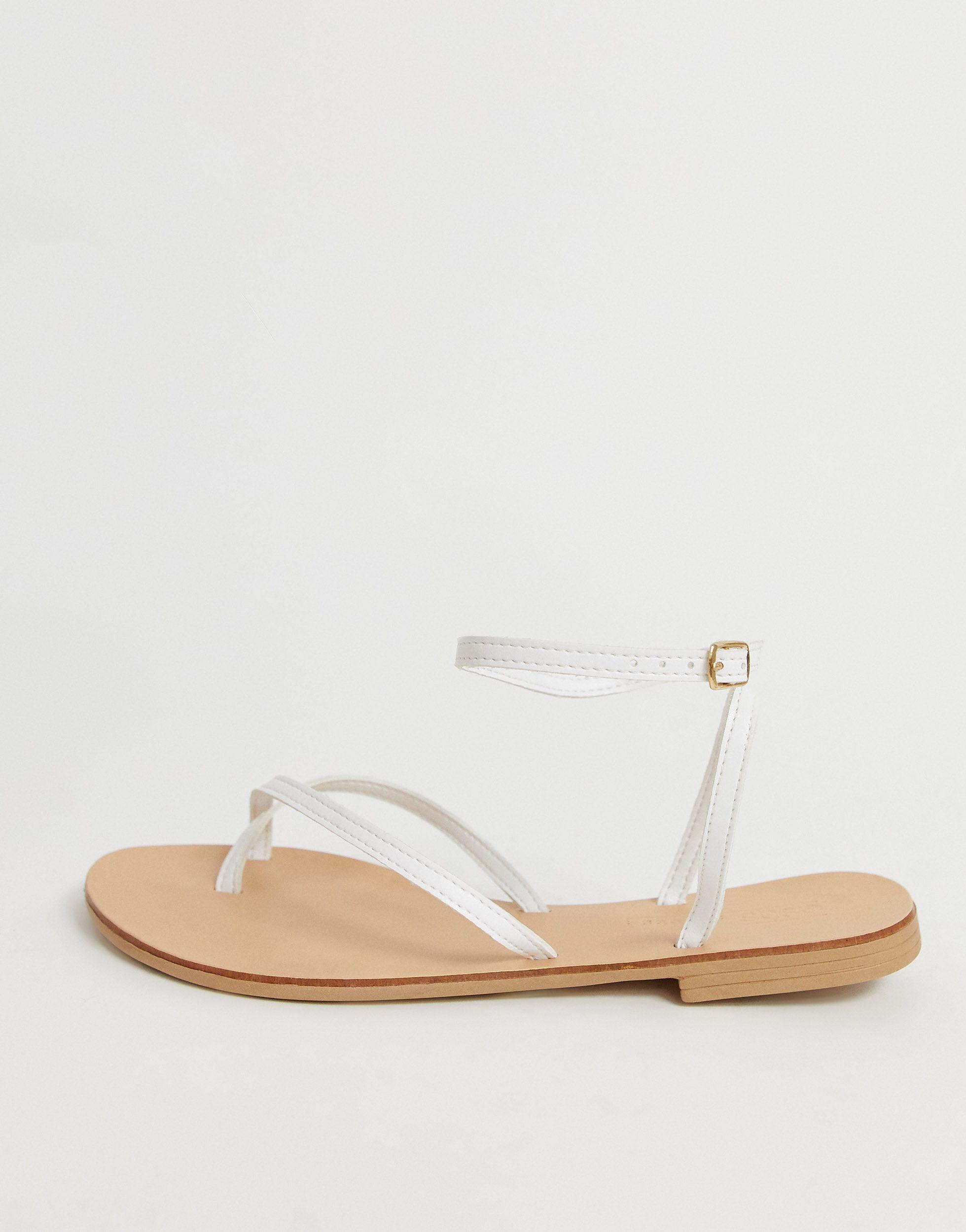 white toe loop sandals