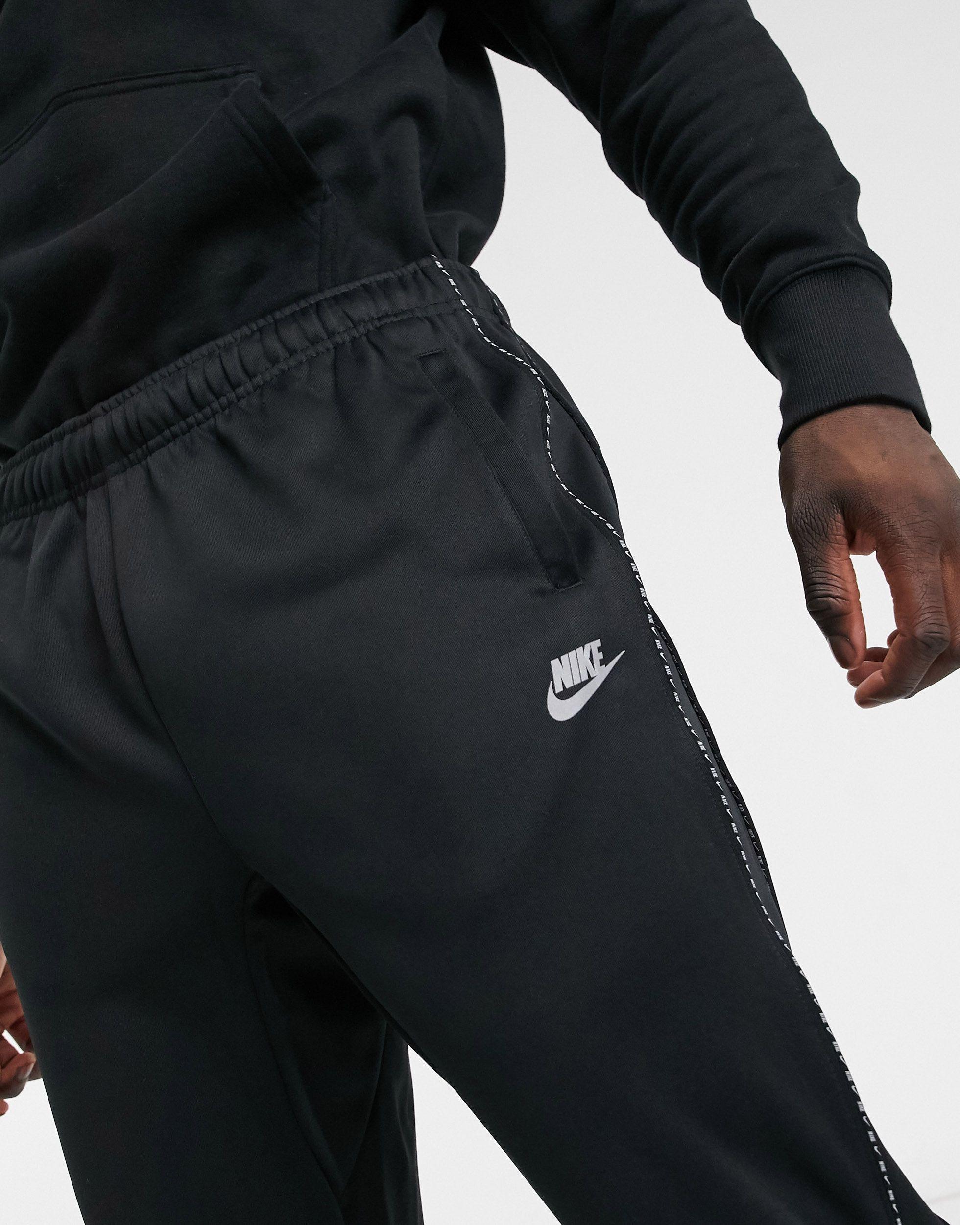 Nike repeat pack logo store taping polyknit hoodie in black