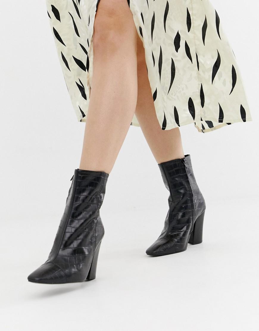 Heeled Leather Ankle Boots in Black 